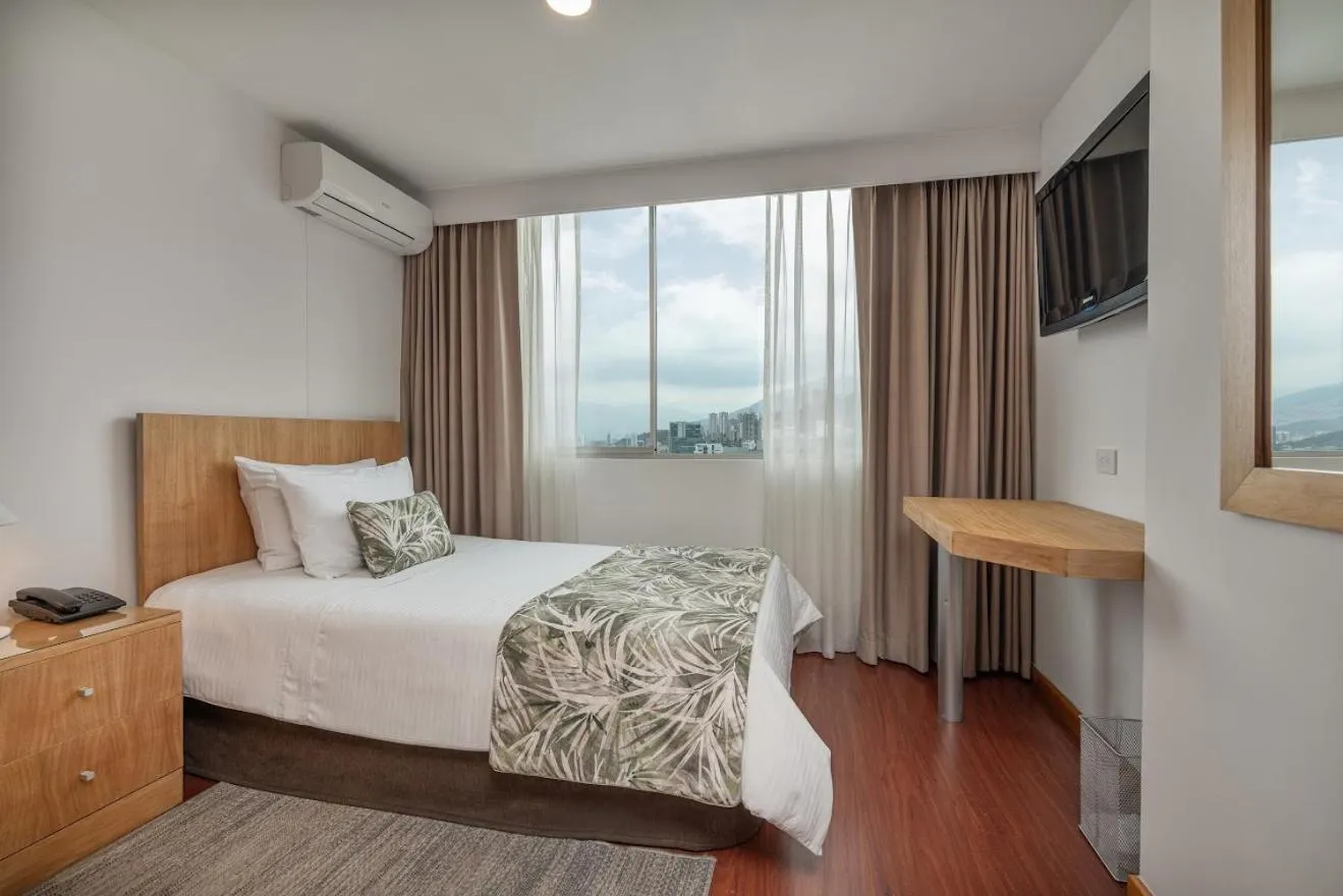 Bed in Affinity ApartaHotel - Extended Stay