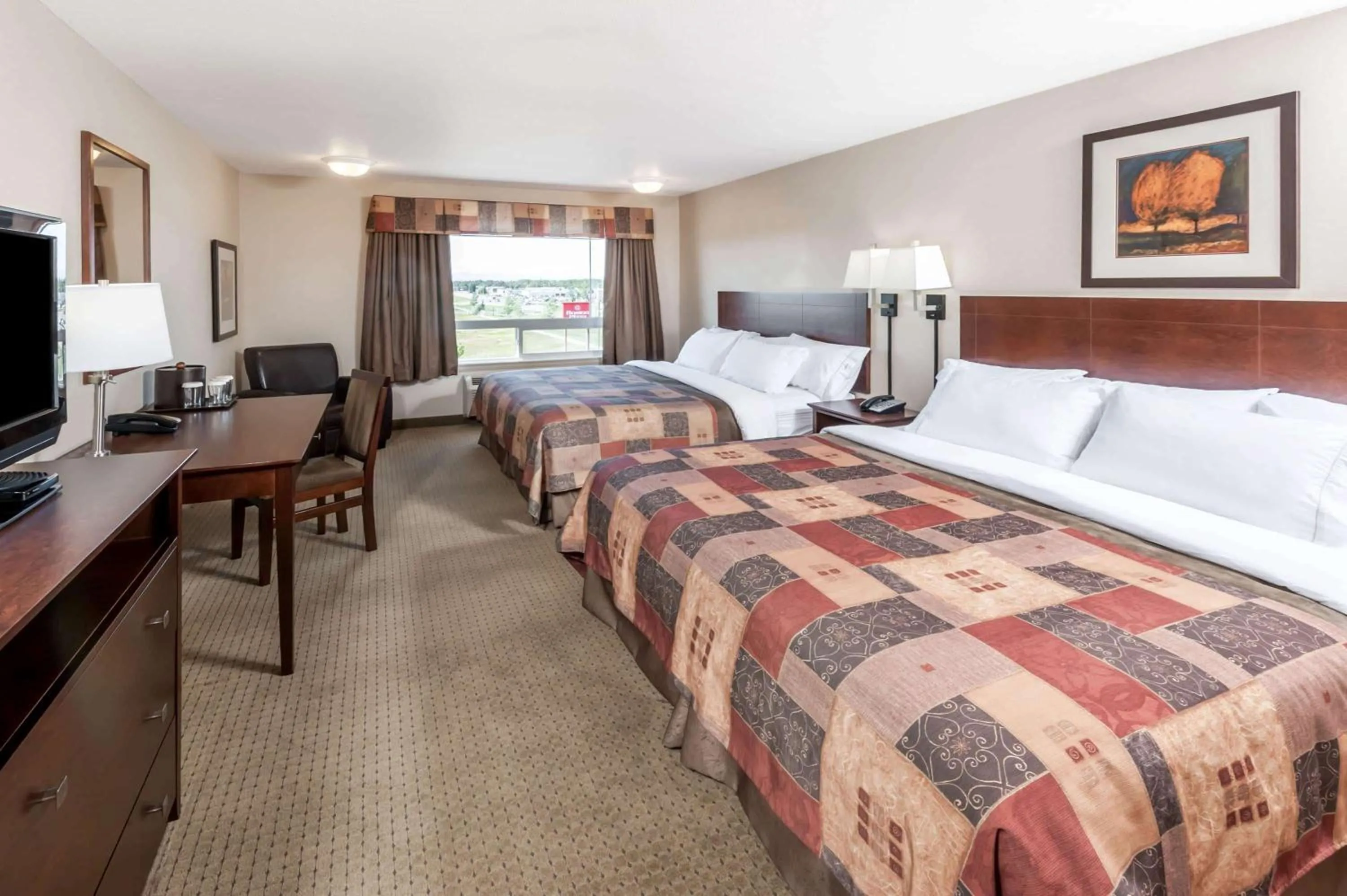 Photo of the whole room in Ramada by Wyndham High River