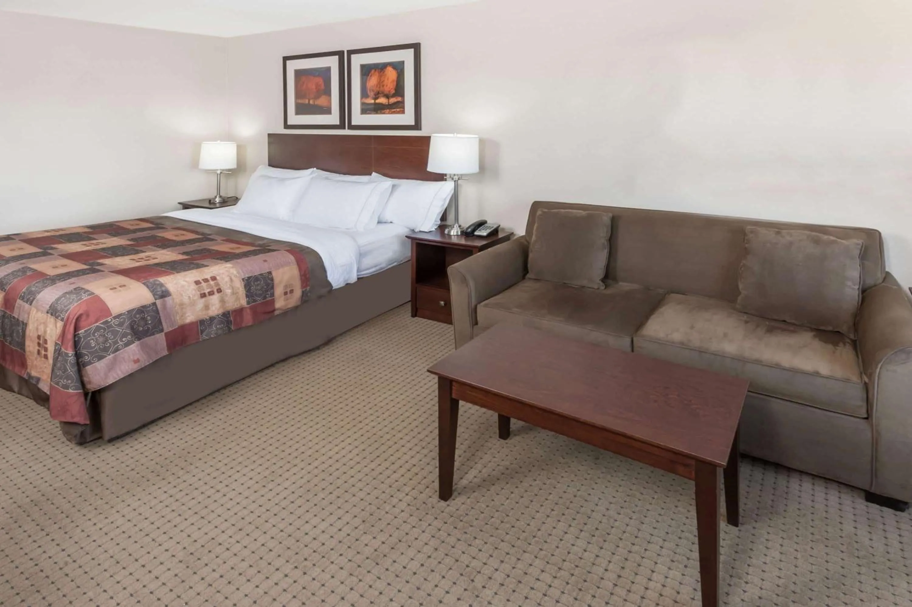 Photo of the whole room in Ramada by Wyndham High River