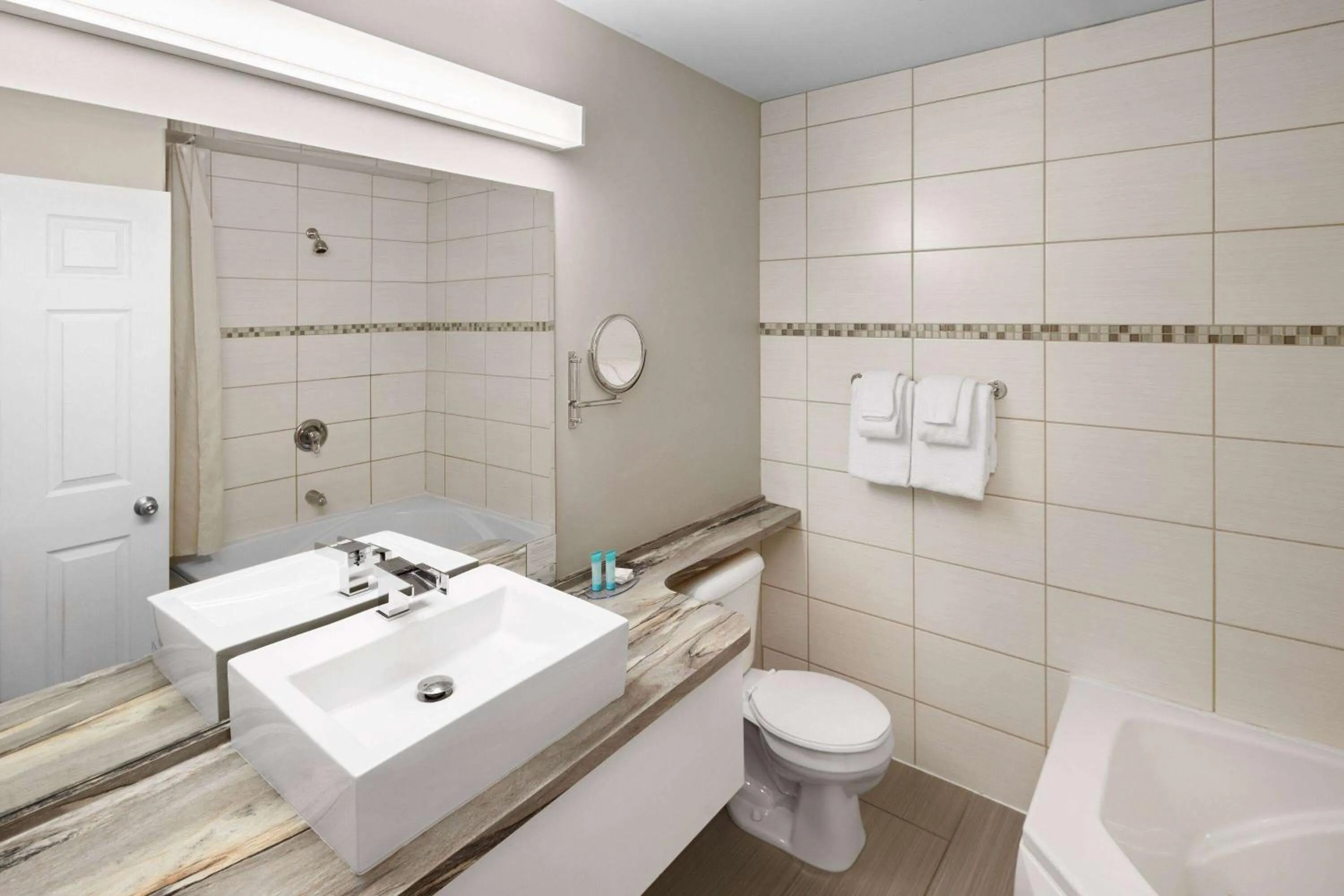 Bathroom in Travelodge by Wyndham Roberval