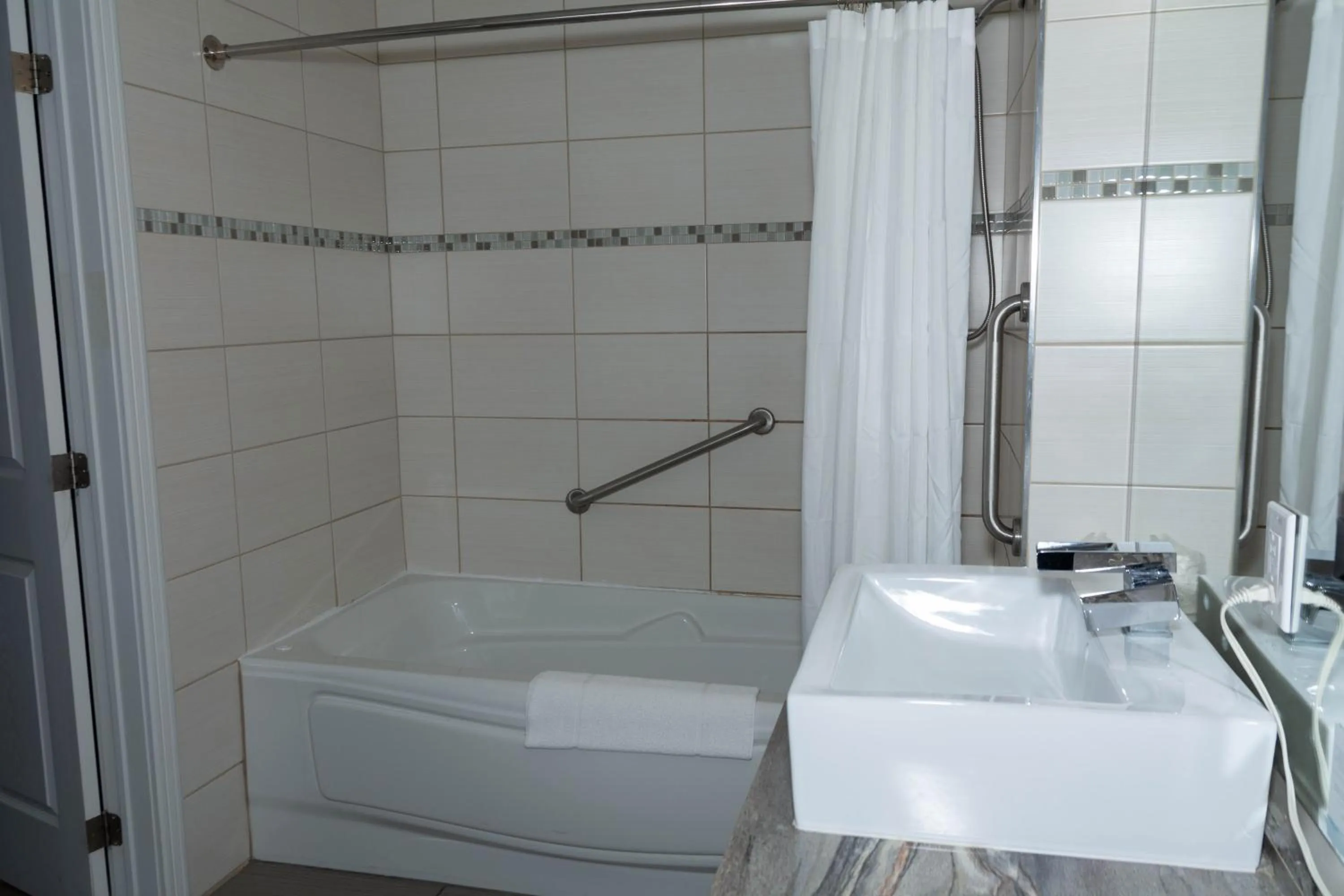 Bathroom in Travelodge by Wyndham Roberval