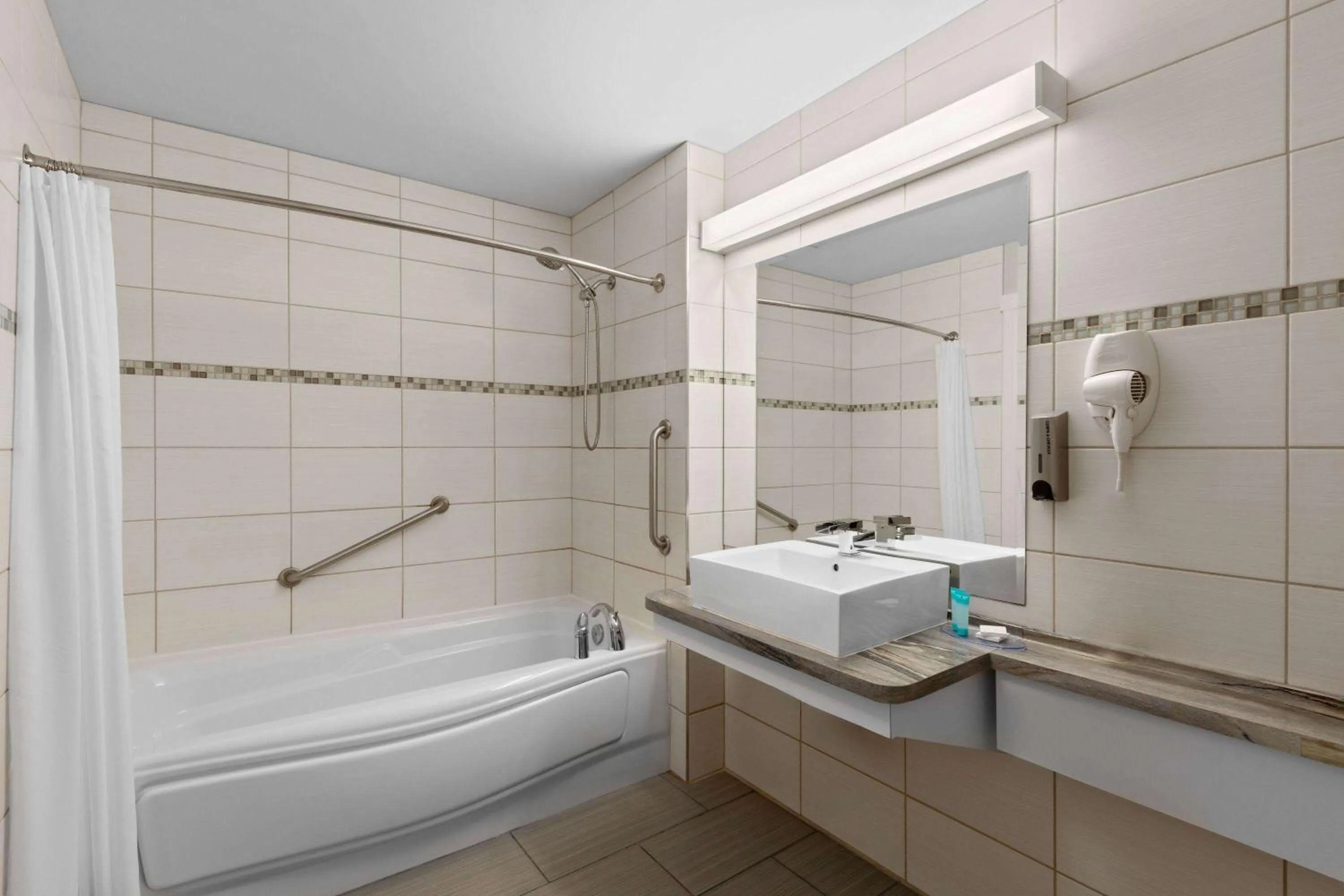 Bathroom in Travelodge by Wyndham Roberval