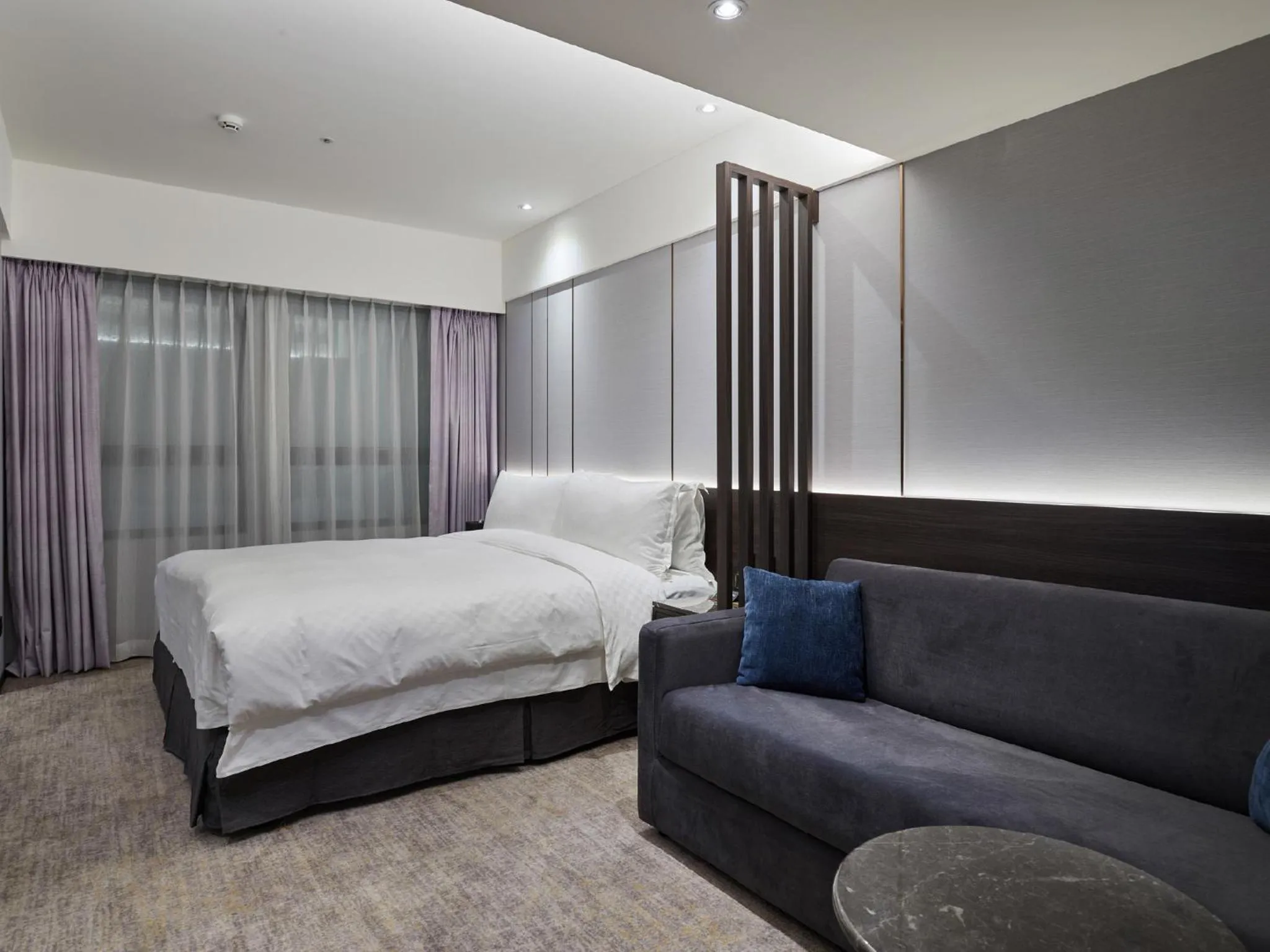 Bed in The Tango Hotel Taipei Linsen