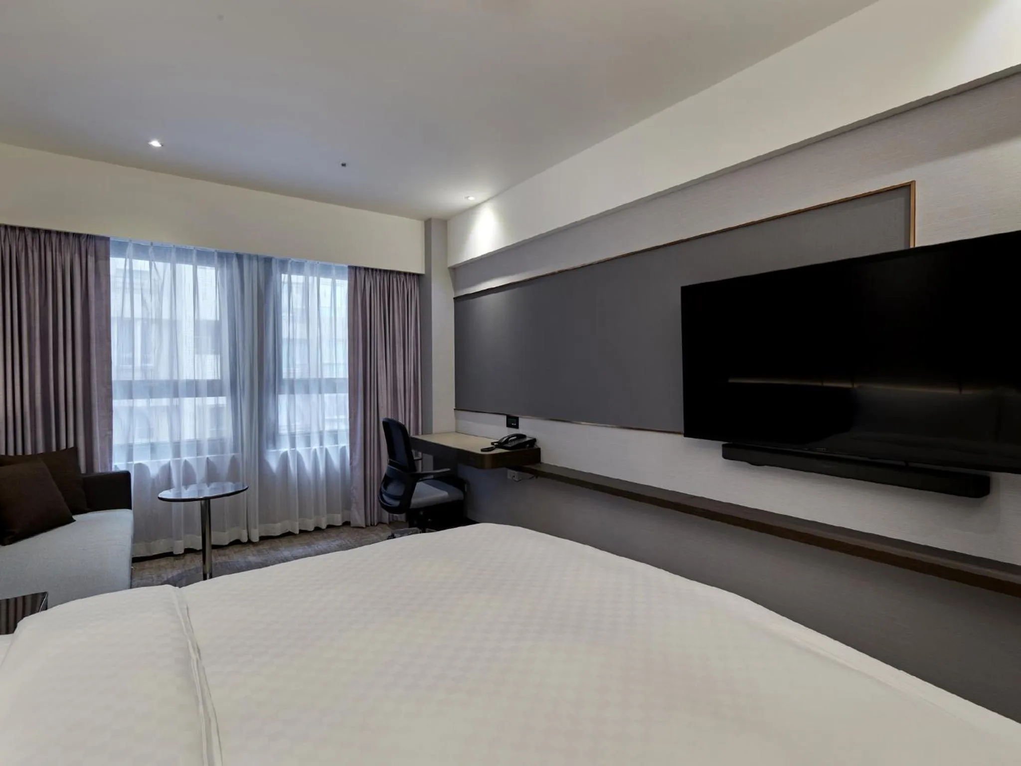 Bed in The Tango Hotel Taipei Linsen