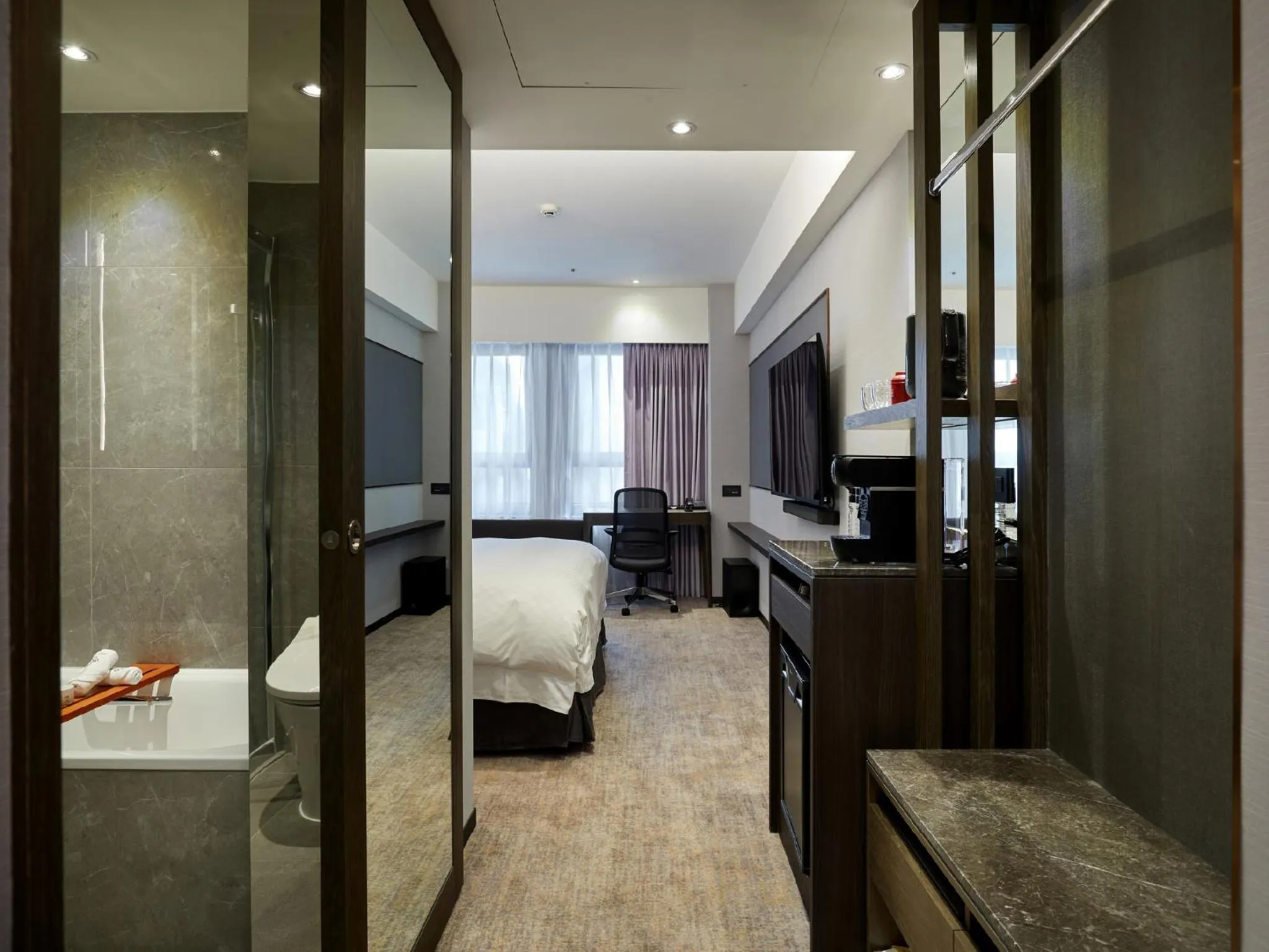 Photo of the whole room, Bed in The Tango Hotel Taipei Linsen