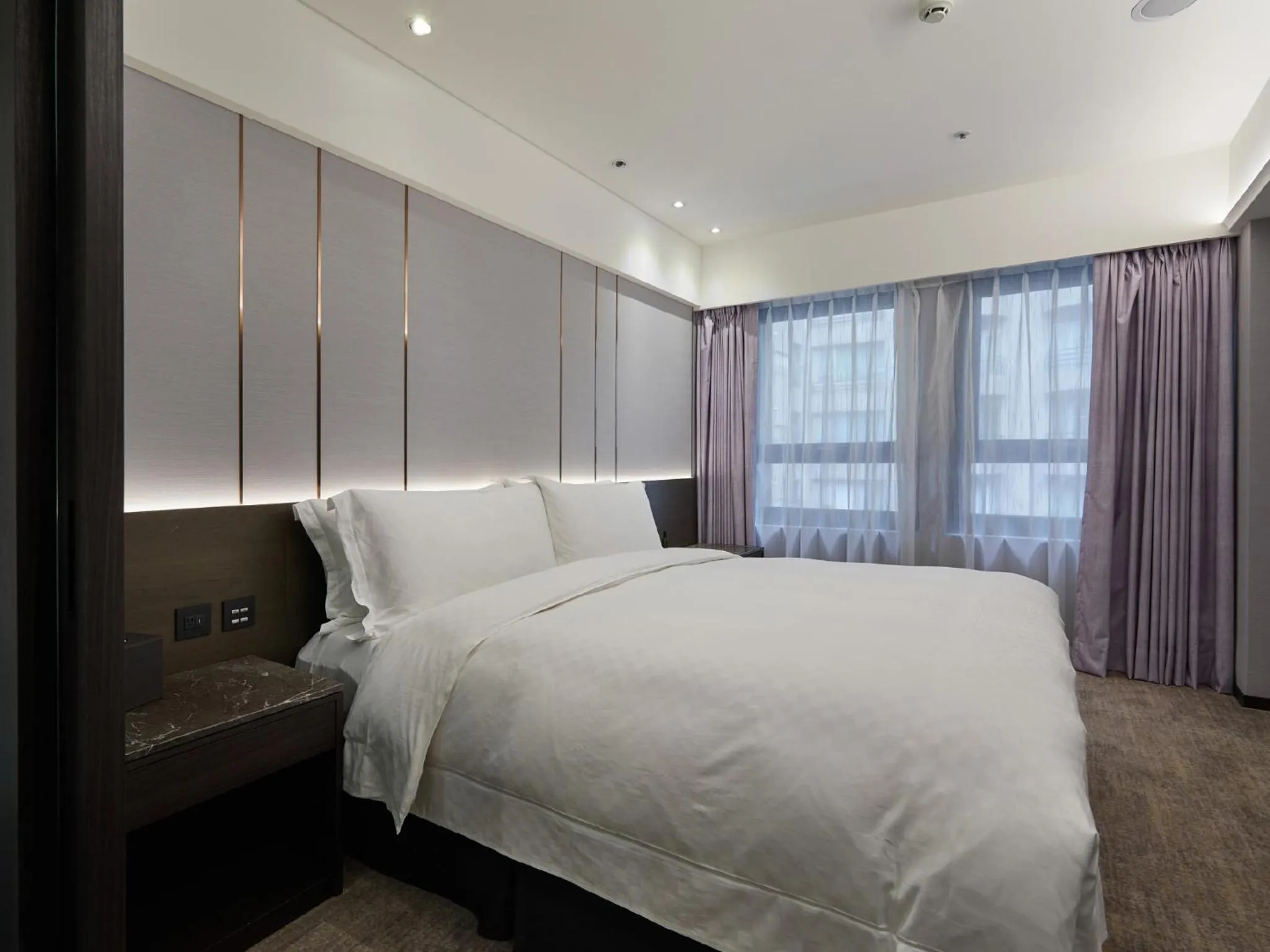 Bed in The Tango Hotel Taipei Linsen