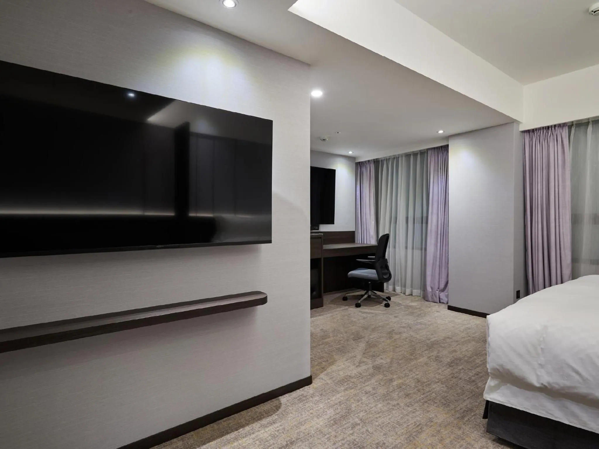 Bed in The Tango Hotel Taipei Linsen