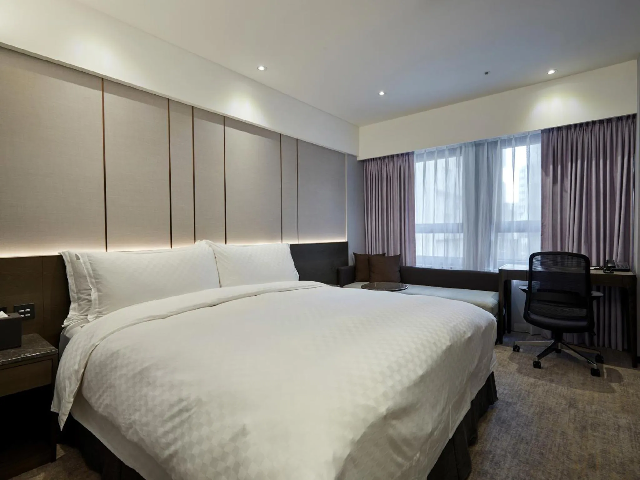 Bed in The Tango Hotel Taipei Linsen