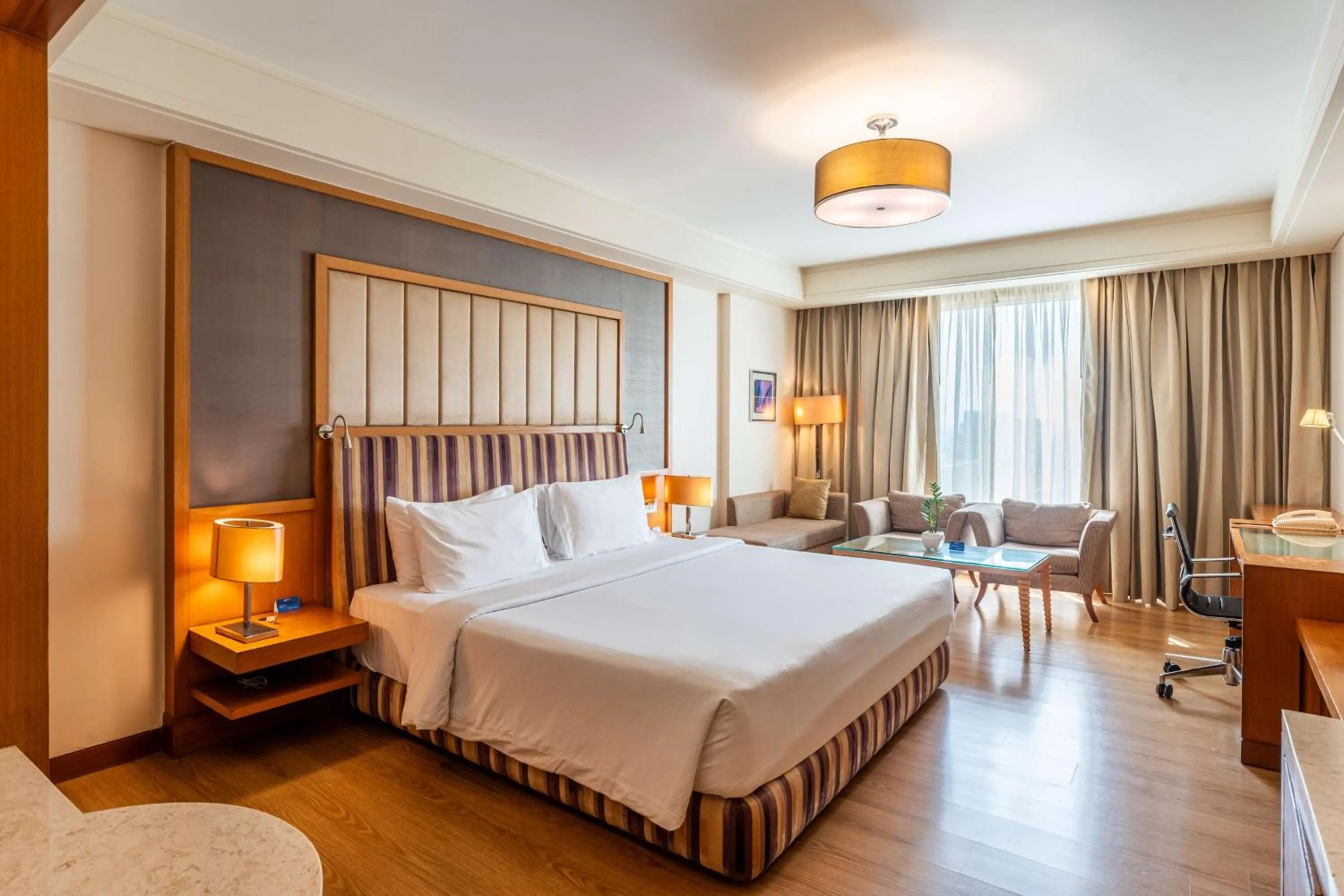 Bedroom, Bed in Radisson Blu Hotel, Indore