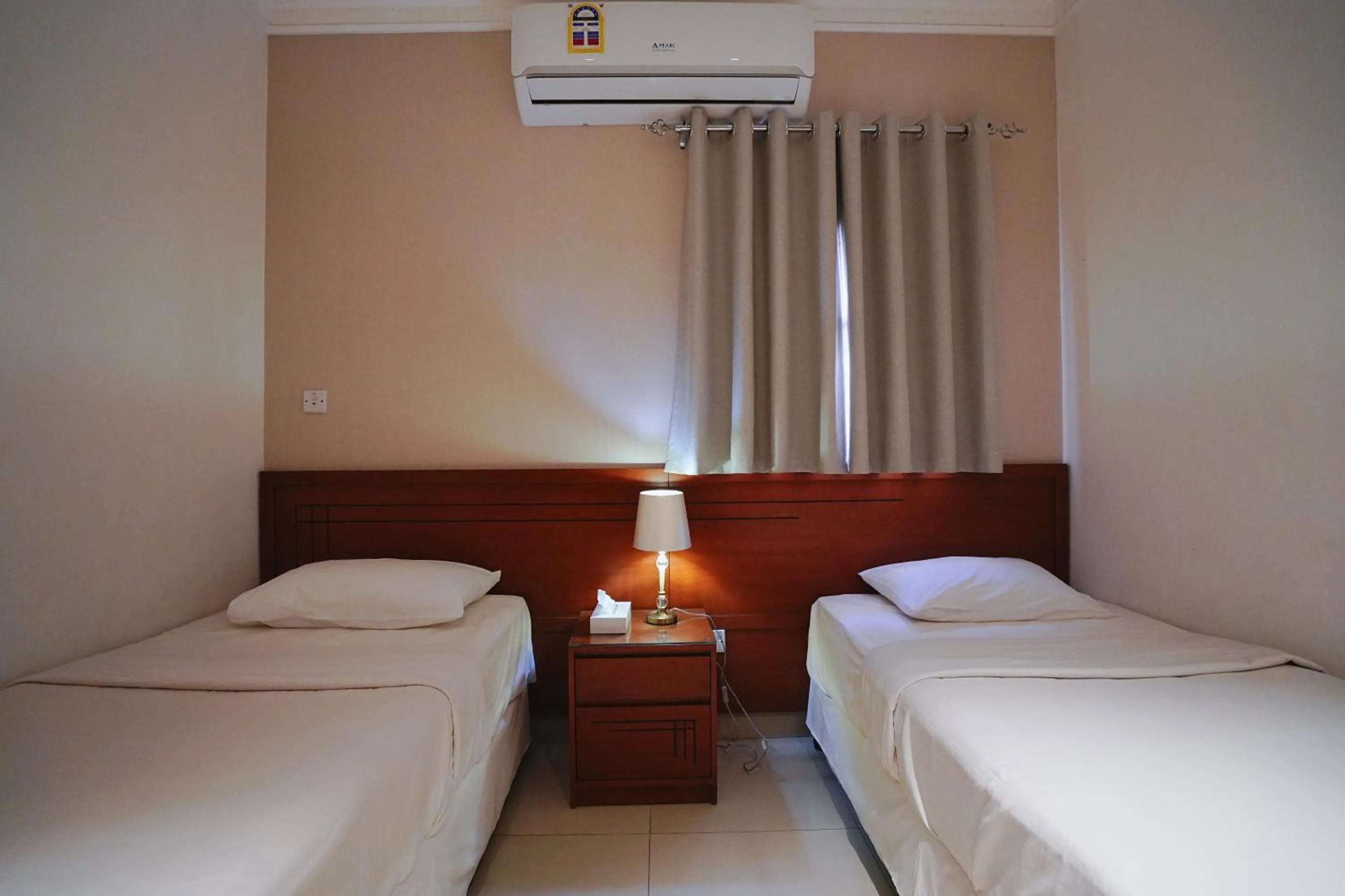 Bed in Tropicana Hotel