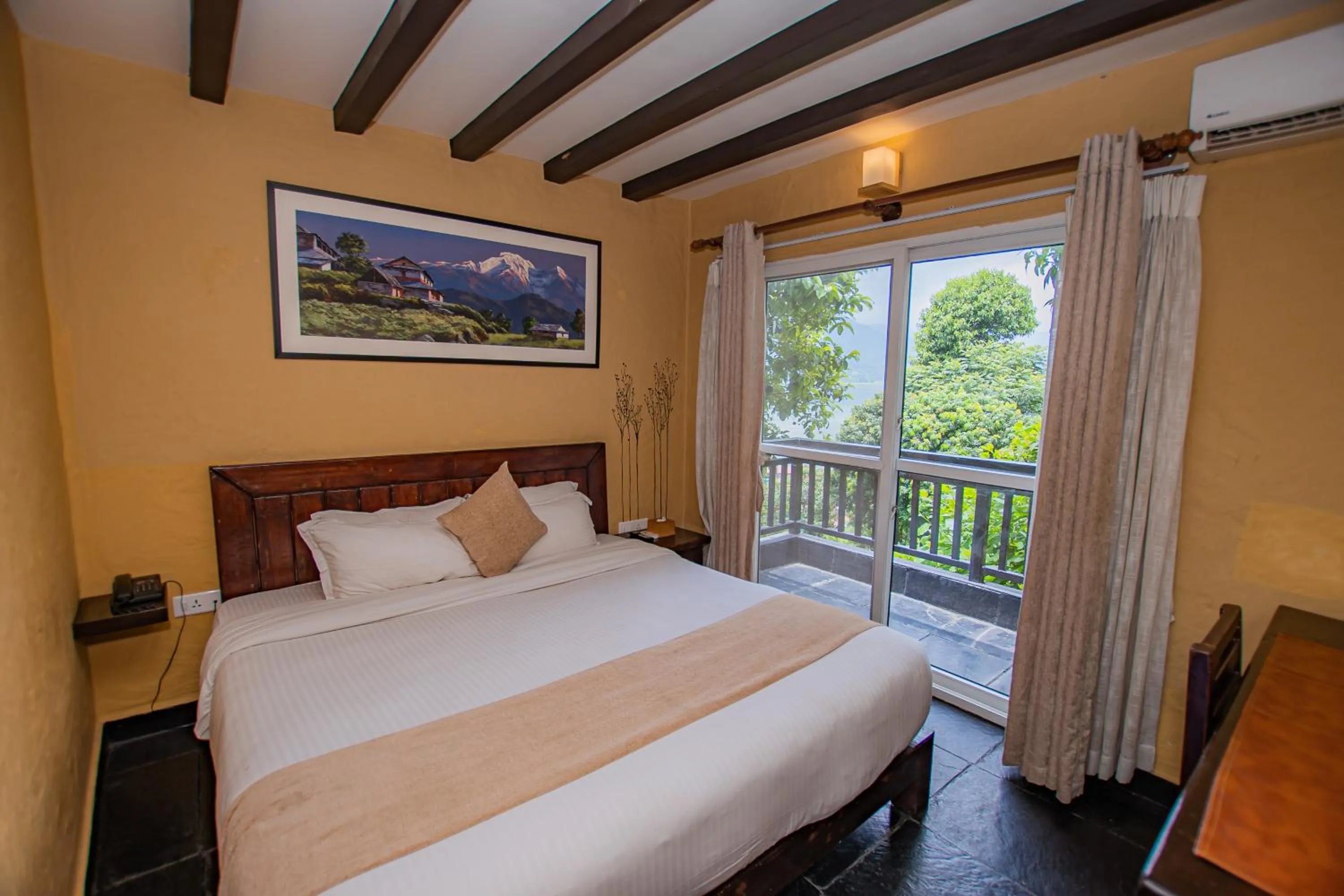Bed in Pokhara Boutique Hotel