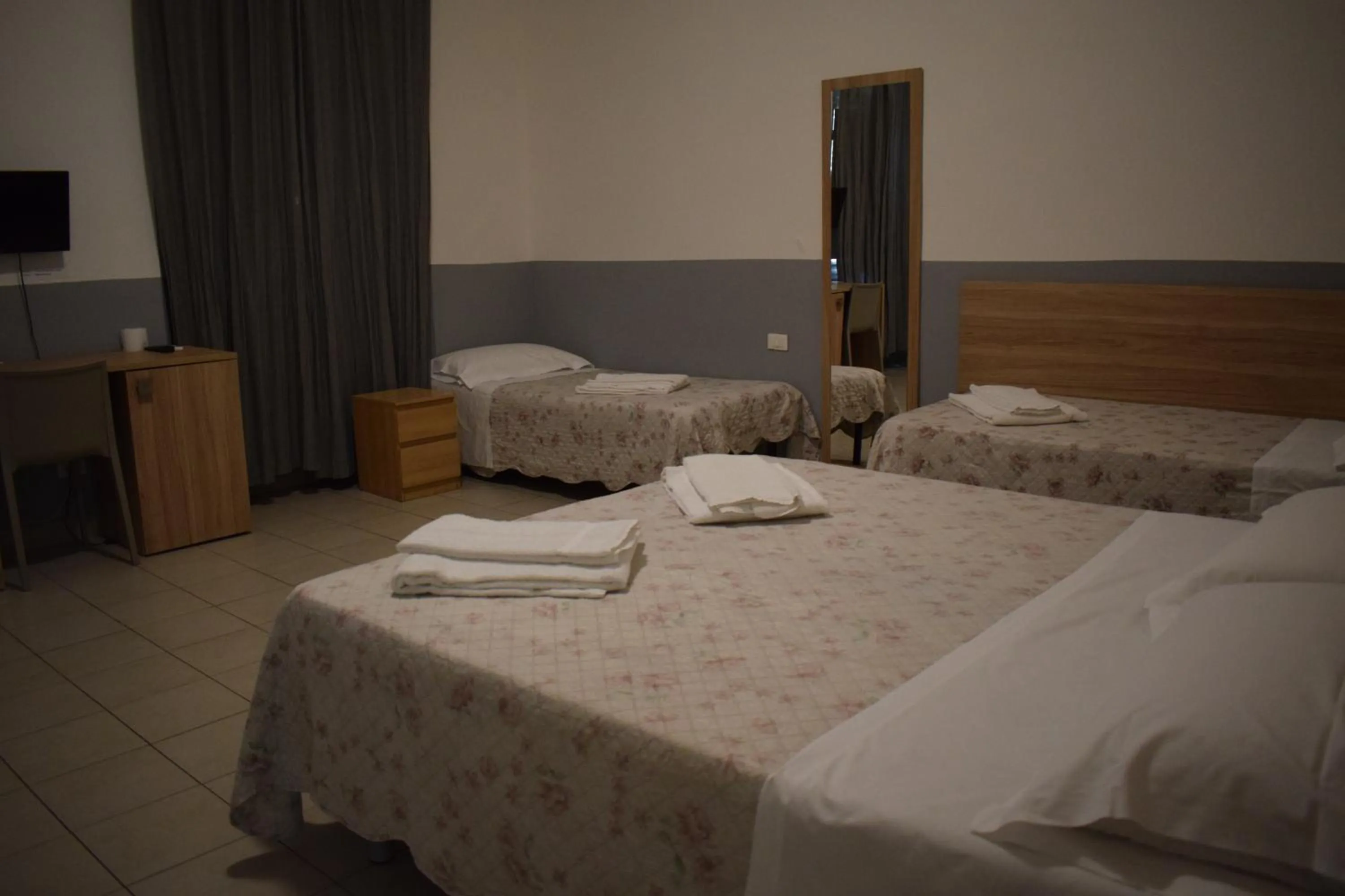 Bed in Golden Dream Guest House