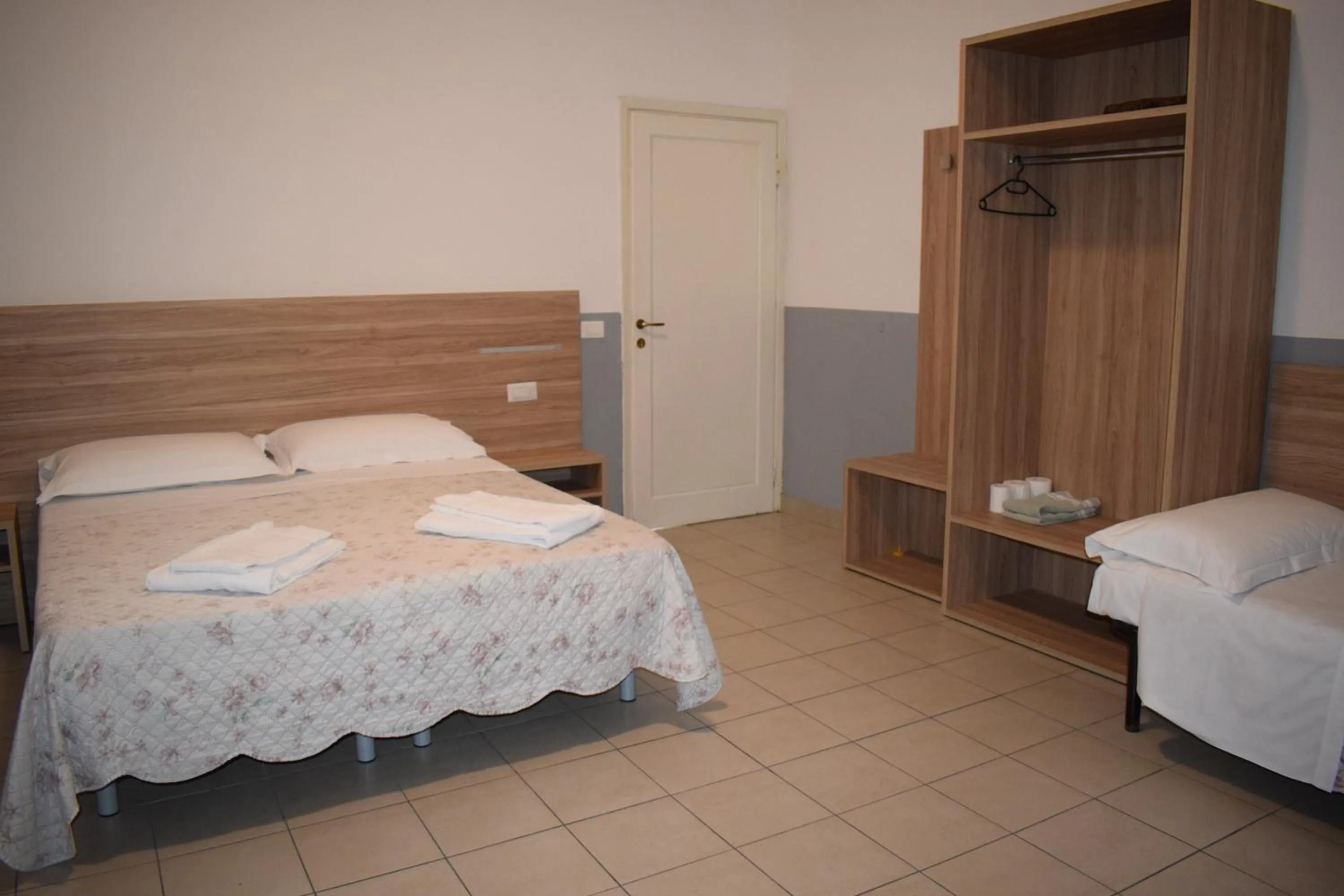 Bed in Golden Dream Guest House