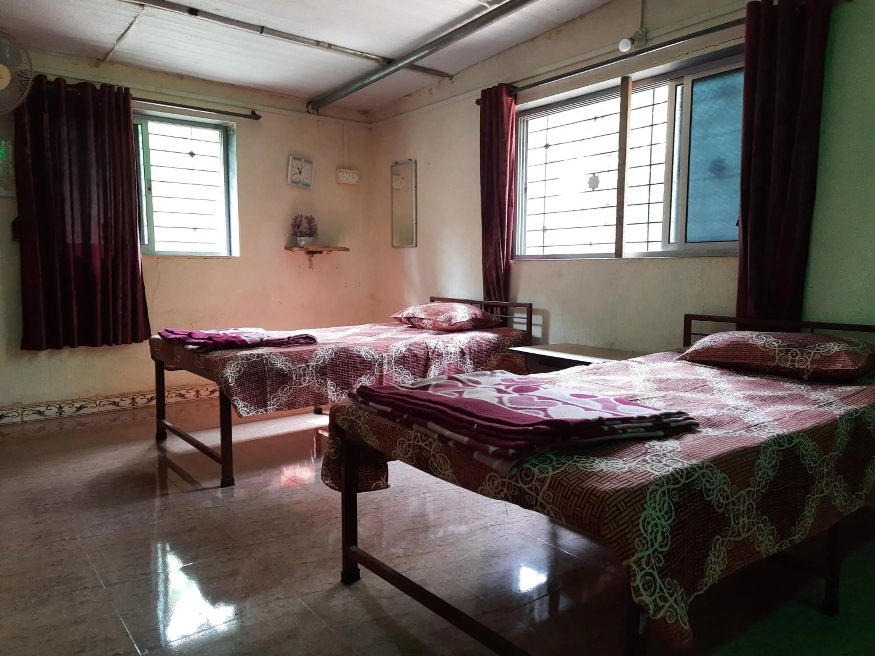 Bed in Vidya Konkan Agro Tourism