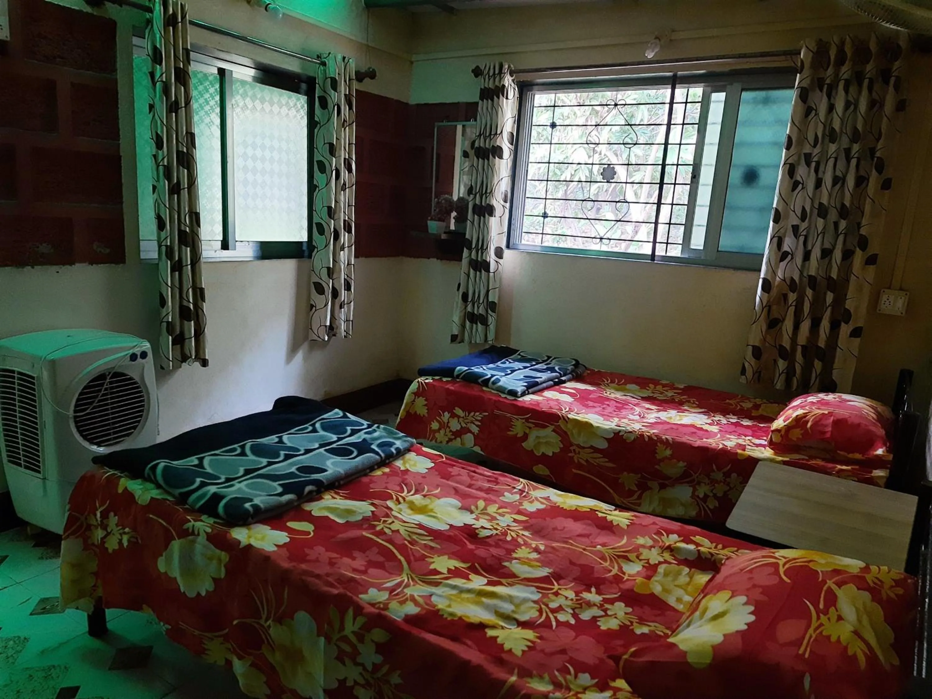 Bed in Vidya Konkan Agro Tourism