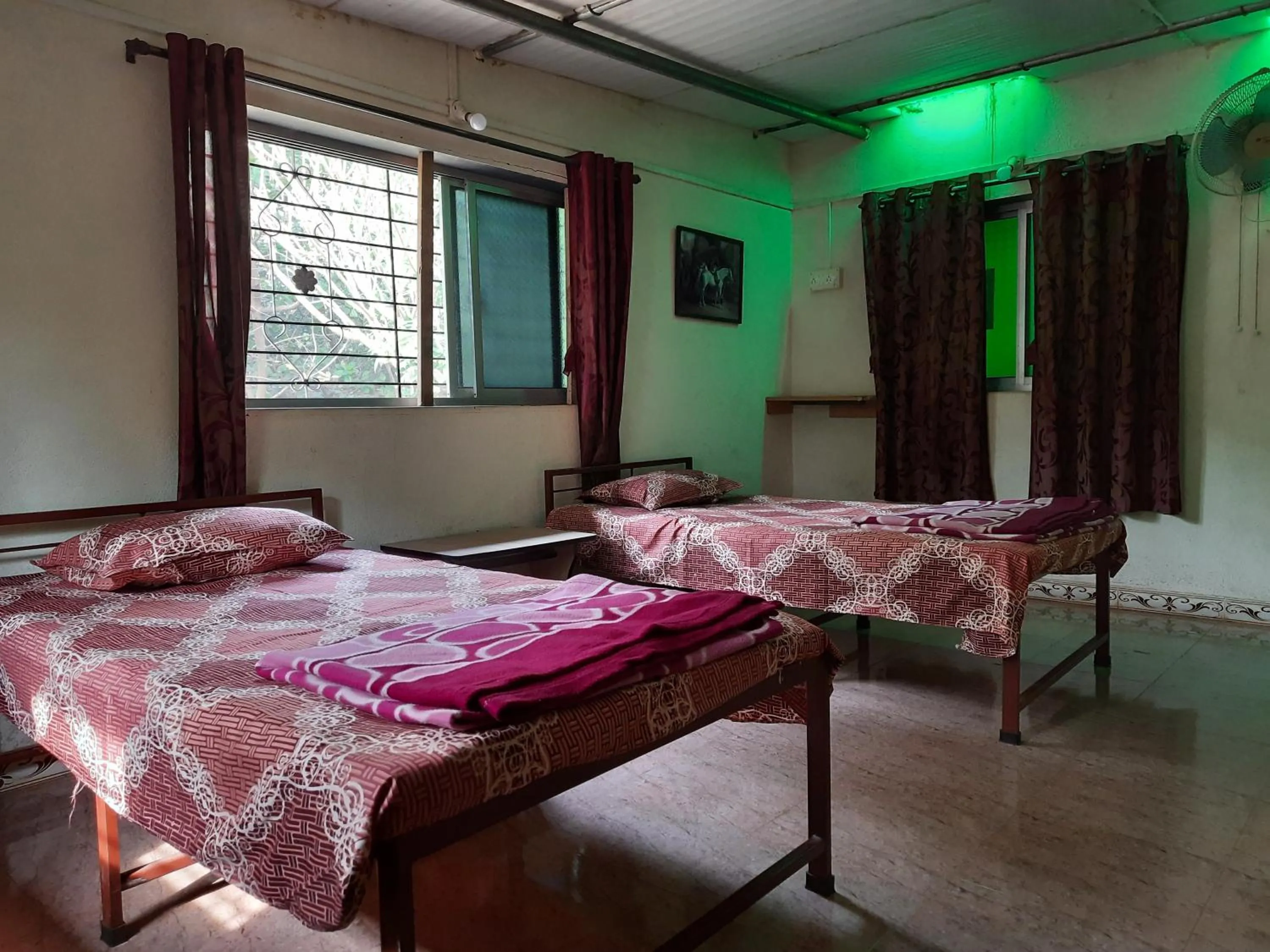 Bed in Vidya Konkan Agro Tourism