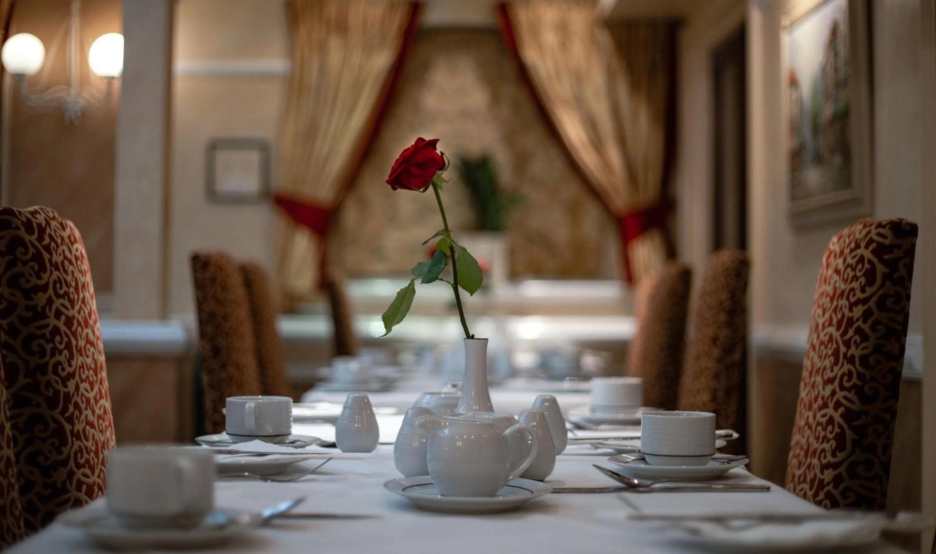 Dining area in Rochester Hotel by Blue Orchid