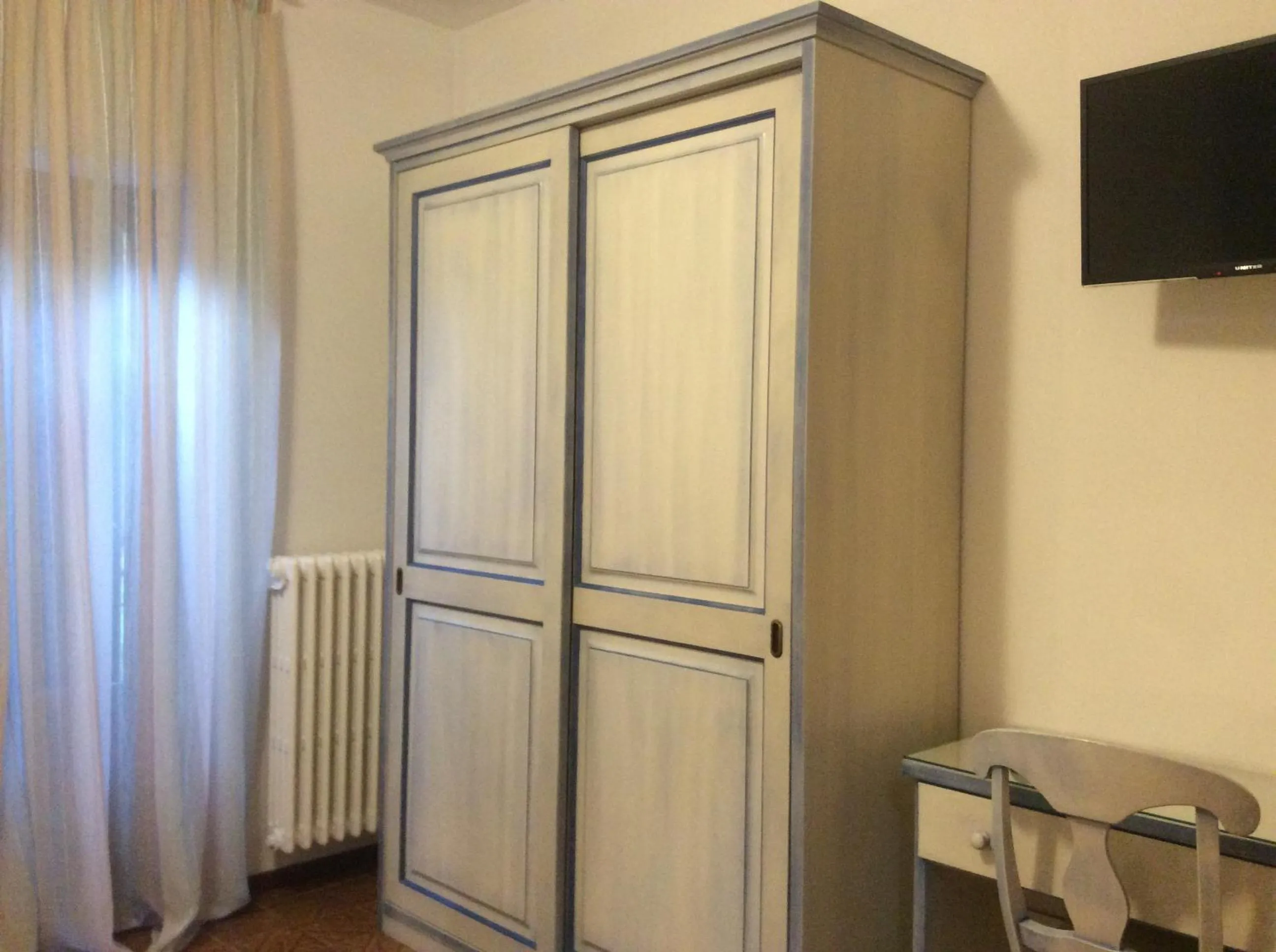 Bedroom in Albergo Ristorante Scanapà