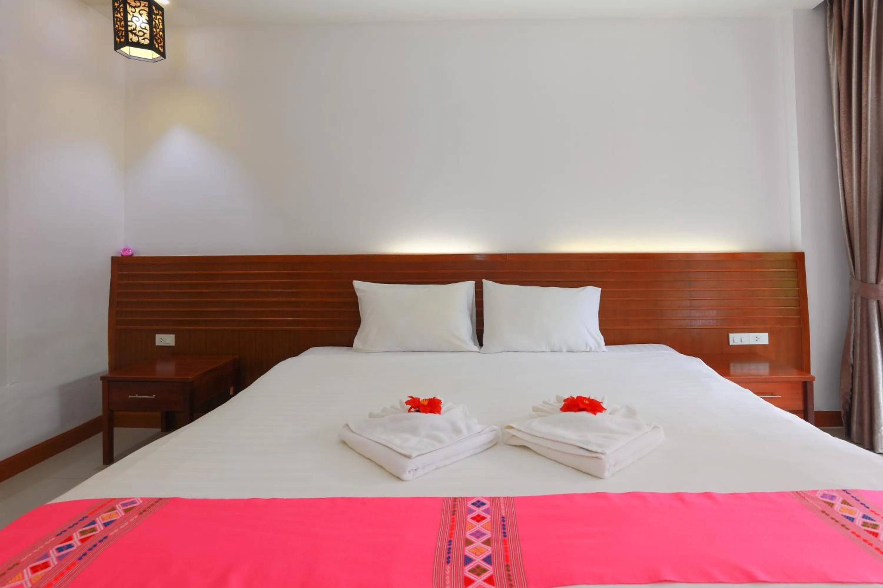 Bed in Baan Vanida Garden Resort