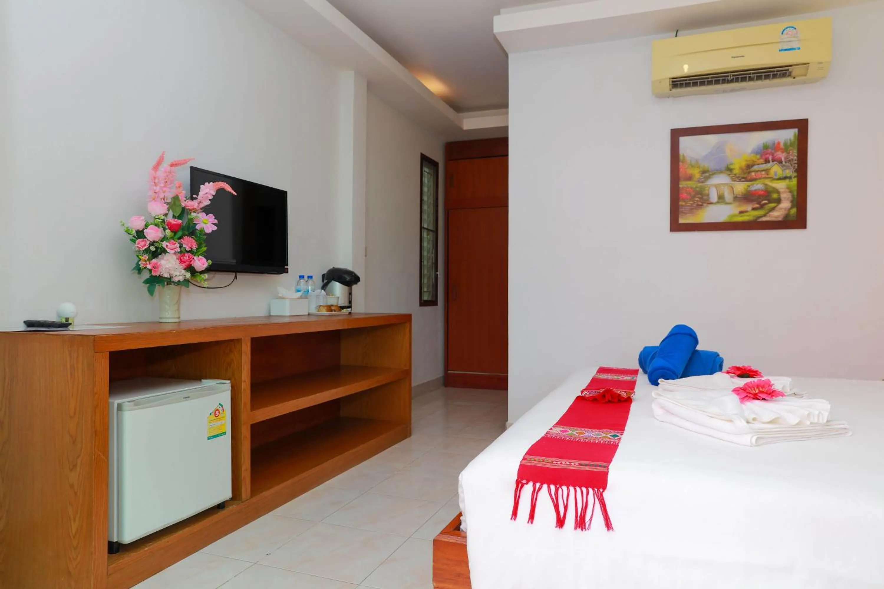 Bed in Baan Vanida Garden Resort