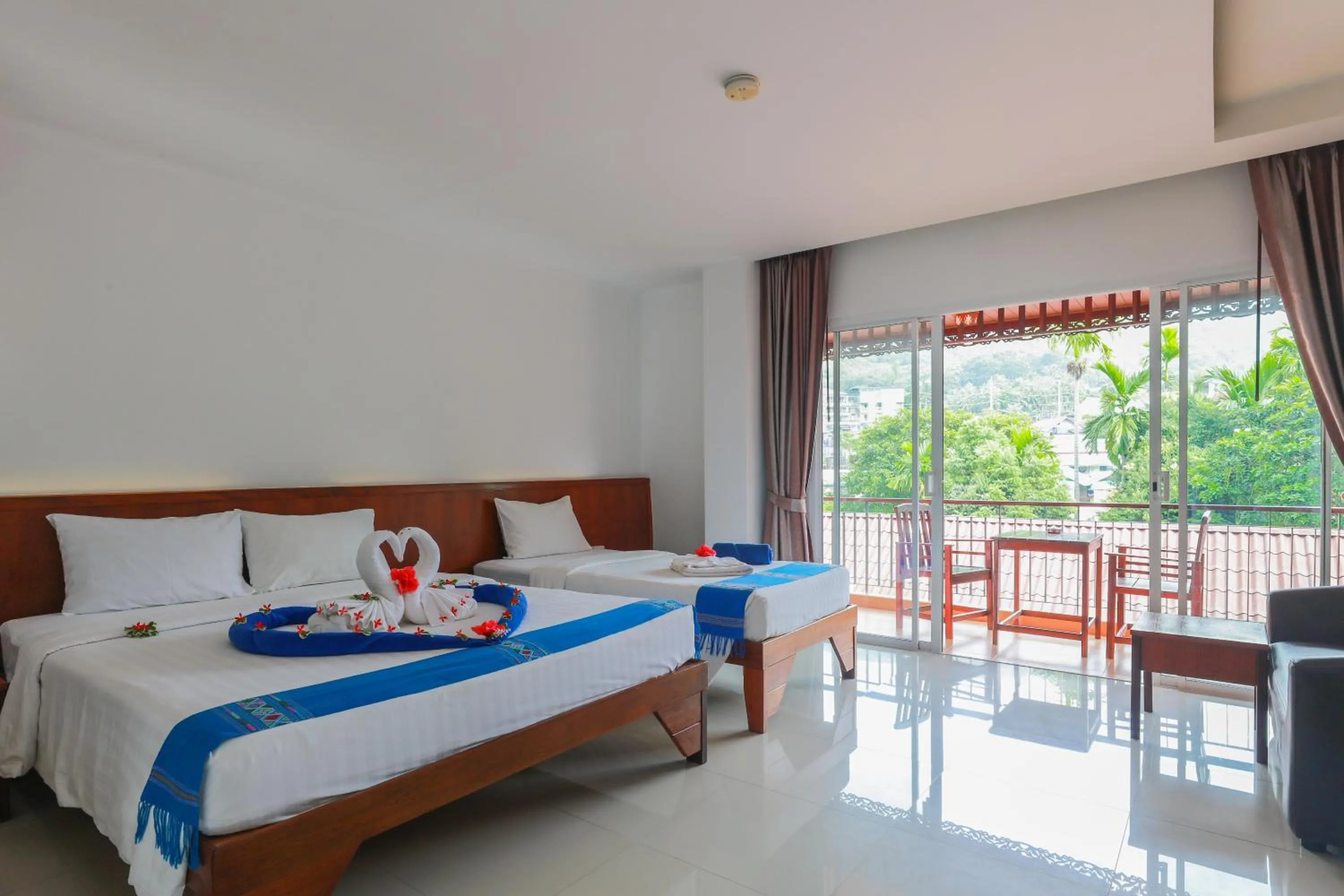 Bed in Baan Vanida Garden Resort