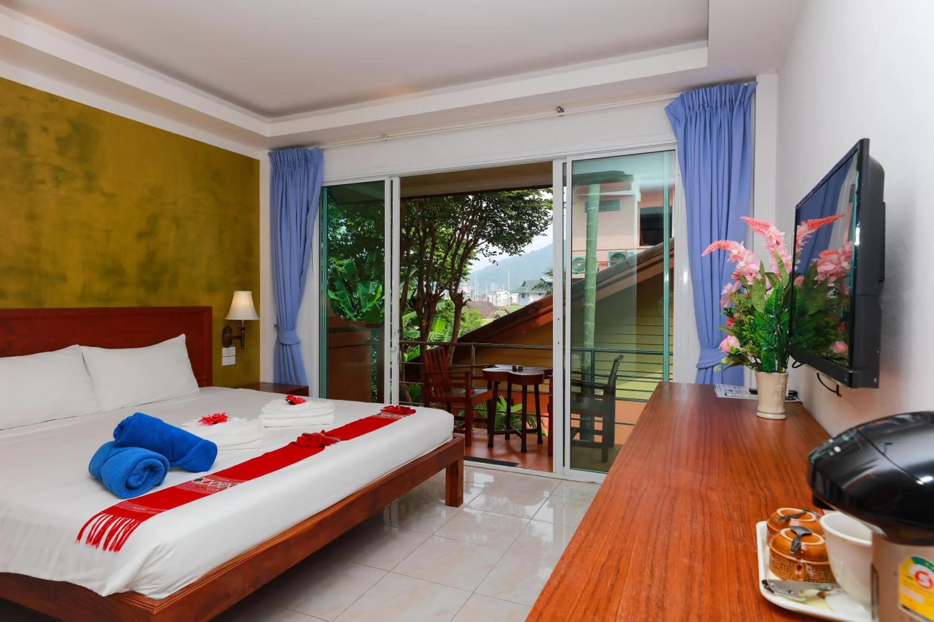 Bed in Baan Vanida Garden Resort
