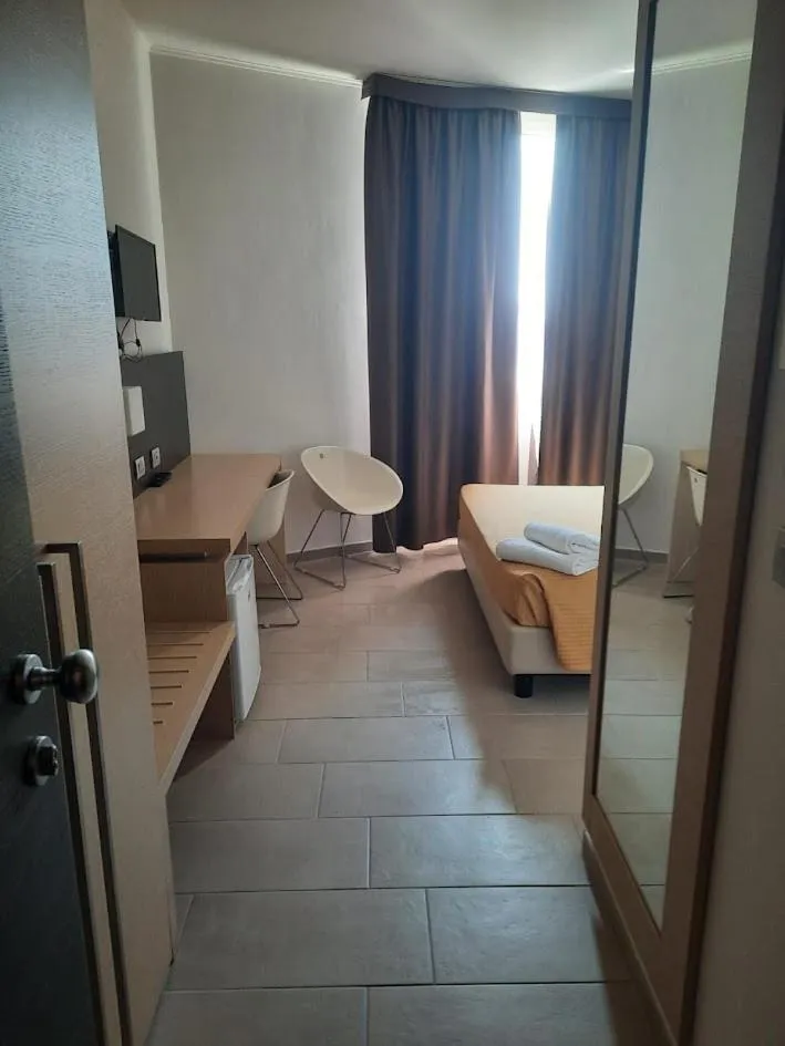 Bed in Hotel Verdina