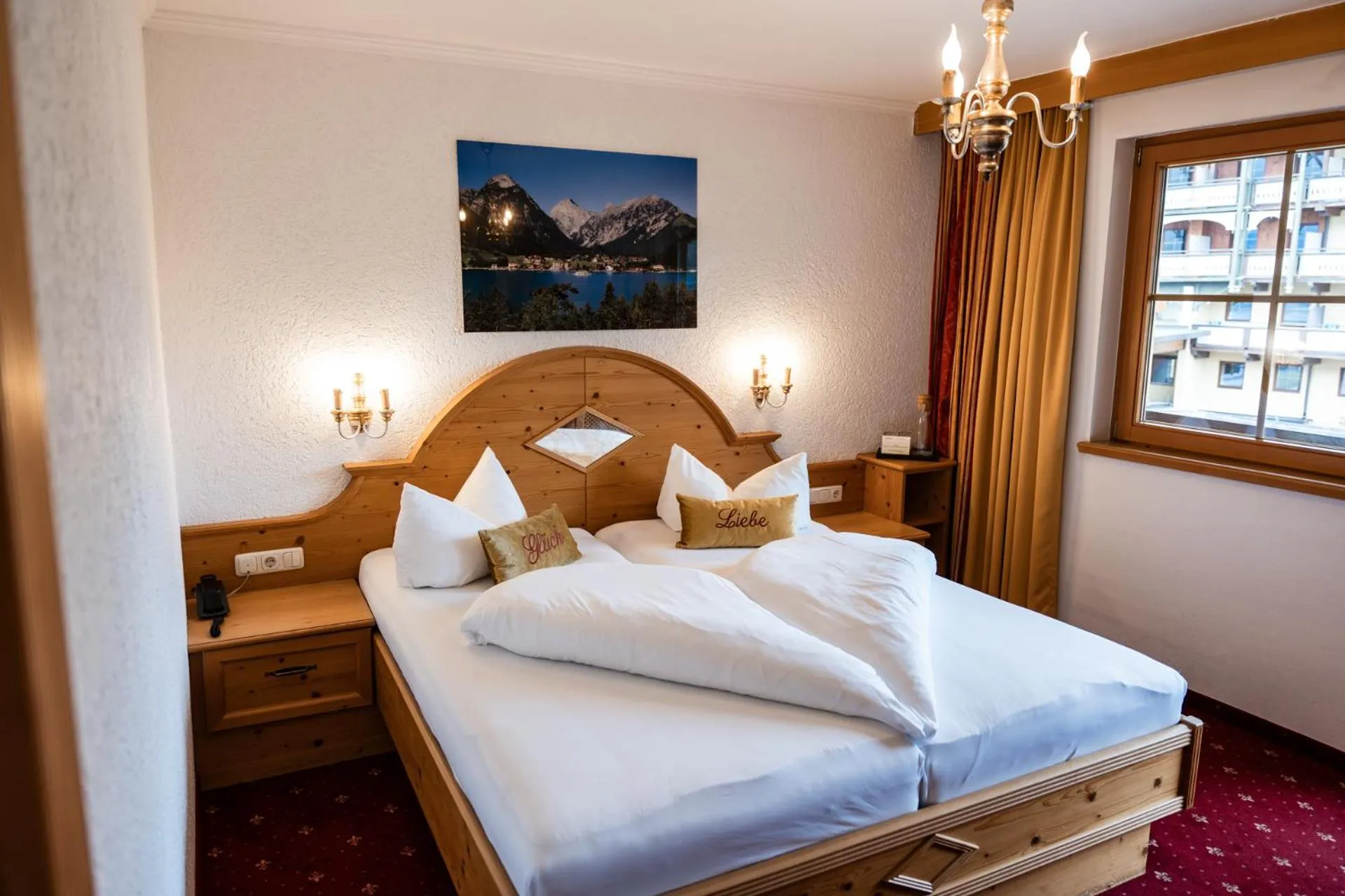 Bed in Liebes Caroline 4-Sterne-Hotel