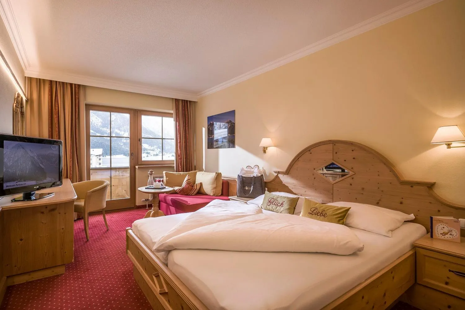 Bed in Liebes Caroline 4-Sterne-Hotel