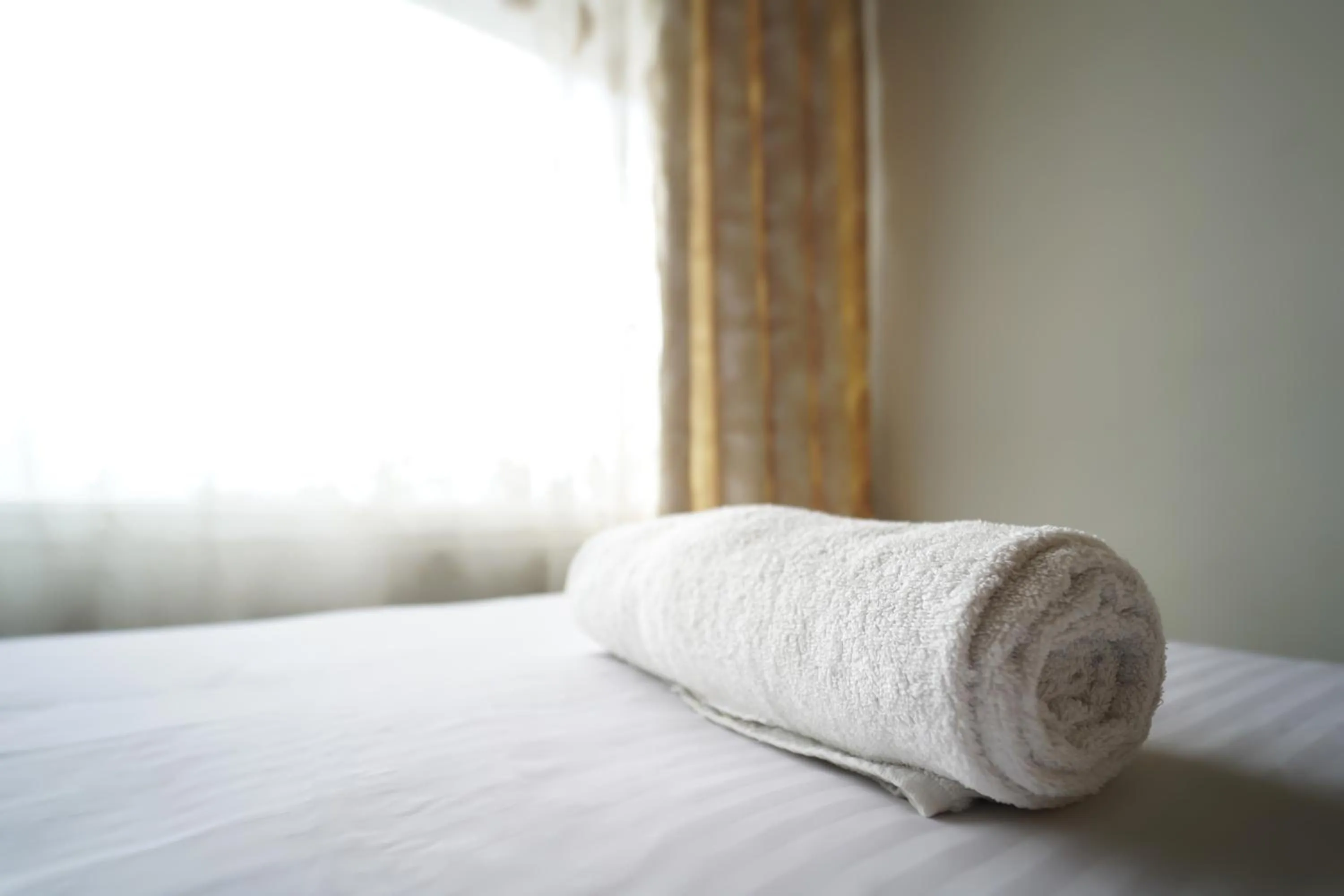 Bed in Hotel Jc Grand