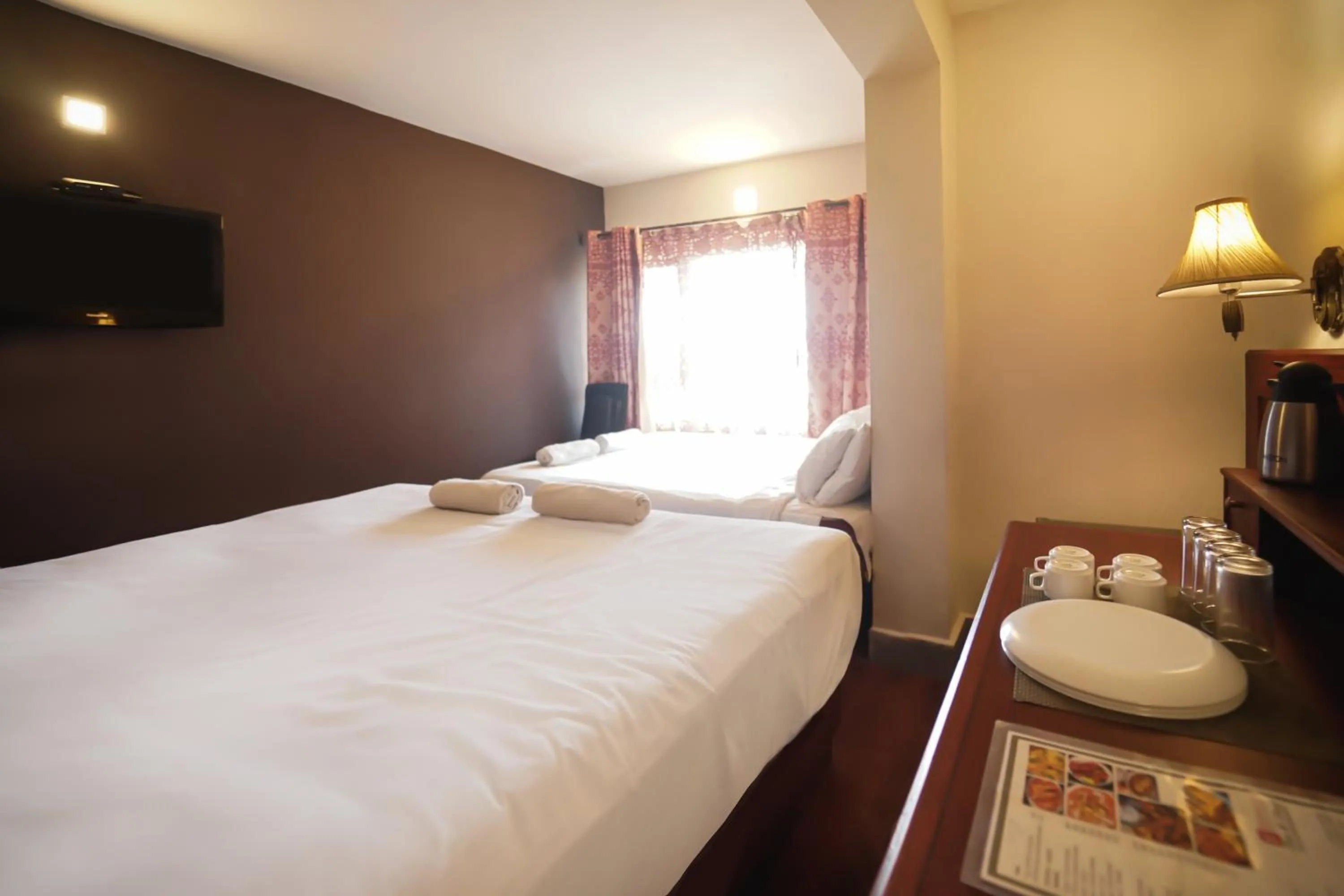 Bed in Hotel Jc Grand