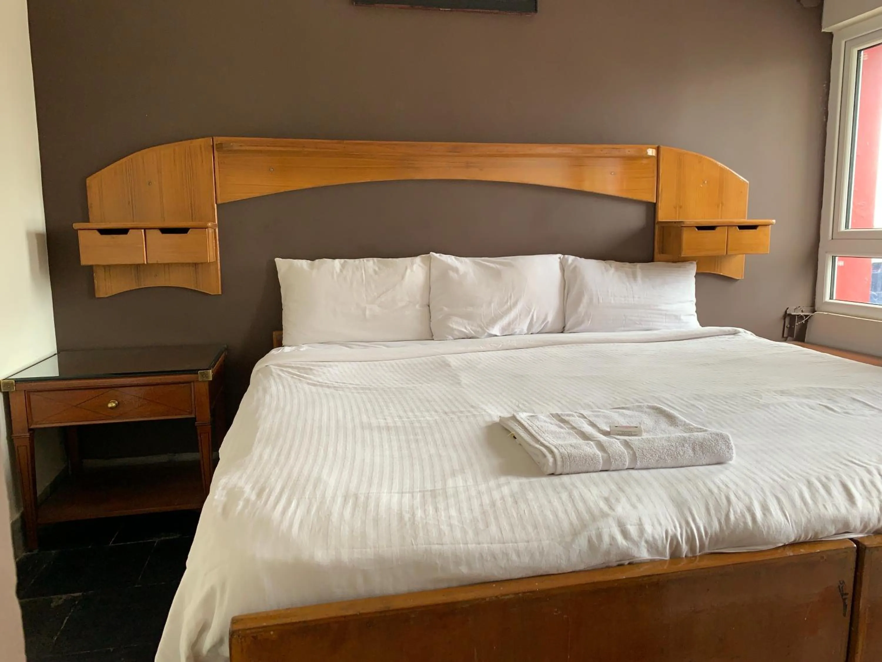 Bed in Hotel Jc Grand