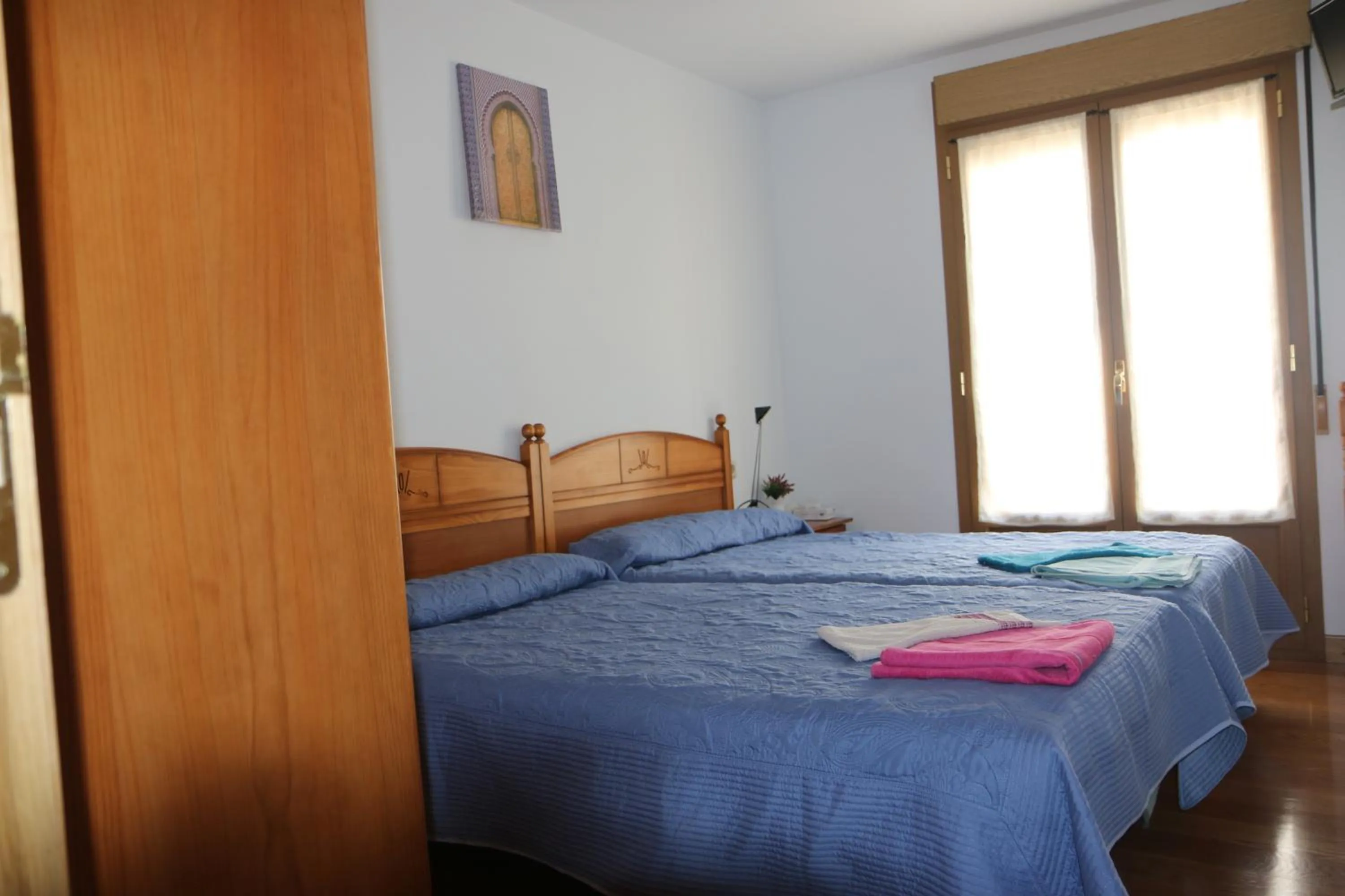 Bed in Hostal La Plaza