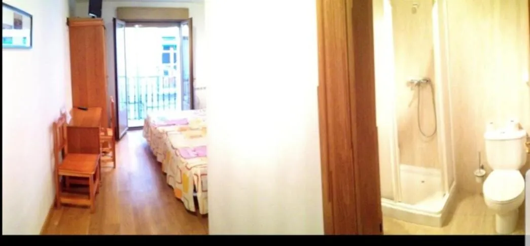 Bed in Hostal La Plaza