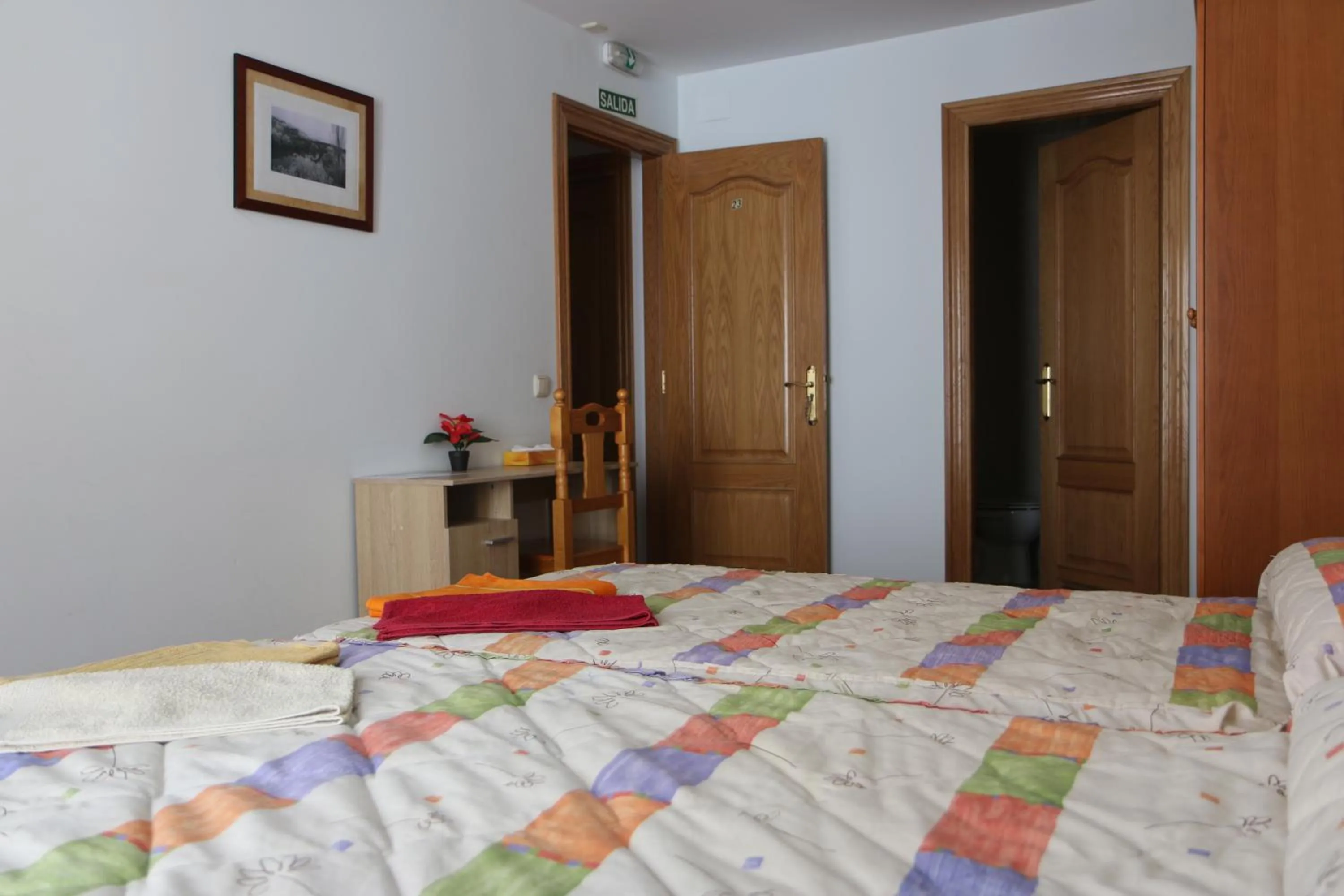 Bed in Hostal La Plaza