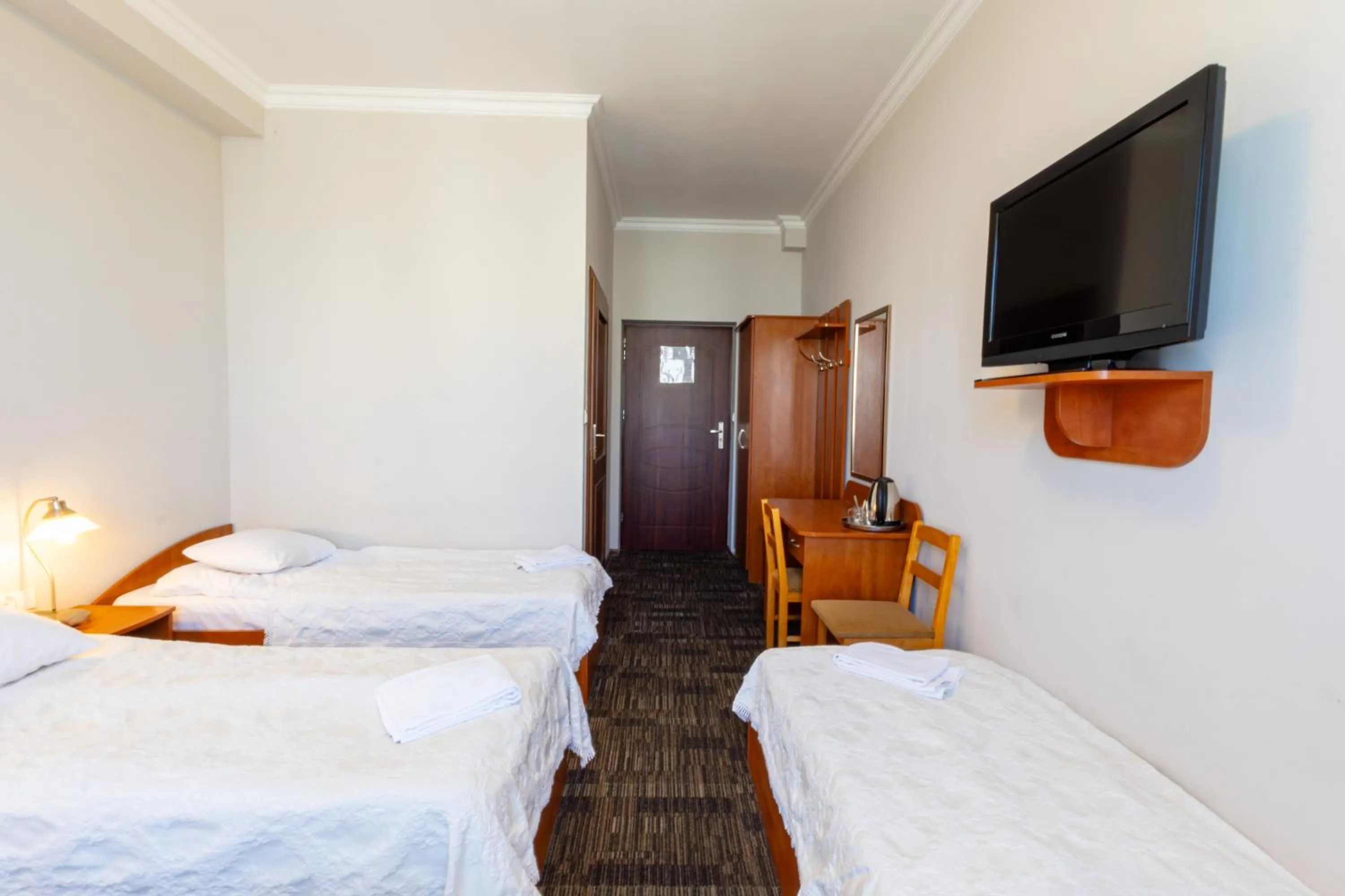 Communal lounge/ TV room, Bed in Noclegi Stadion Bed & Breakfast