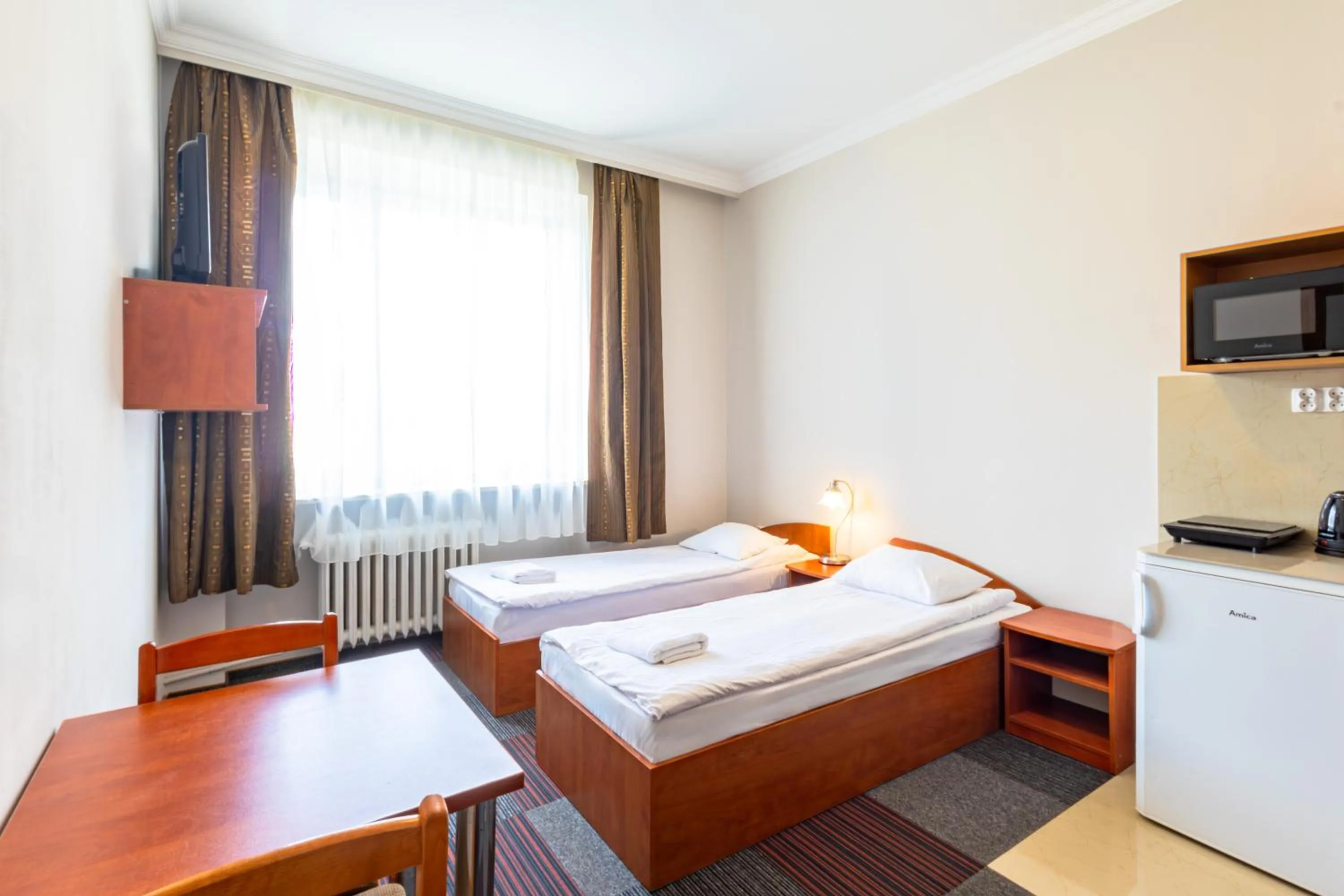 Communal lounge/ TV room, Bed in Noclegi Stadion Bed & Breakfast