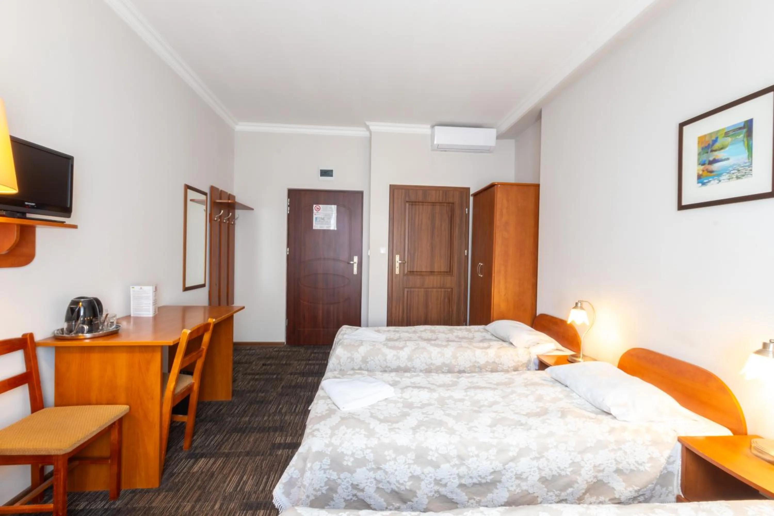 Communal lounge/ TV room, Bed in Noclegi Stadion Bed & Breakfast