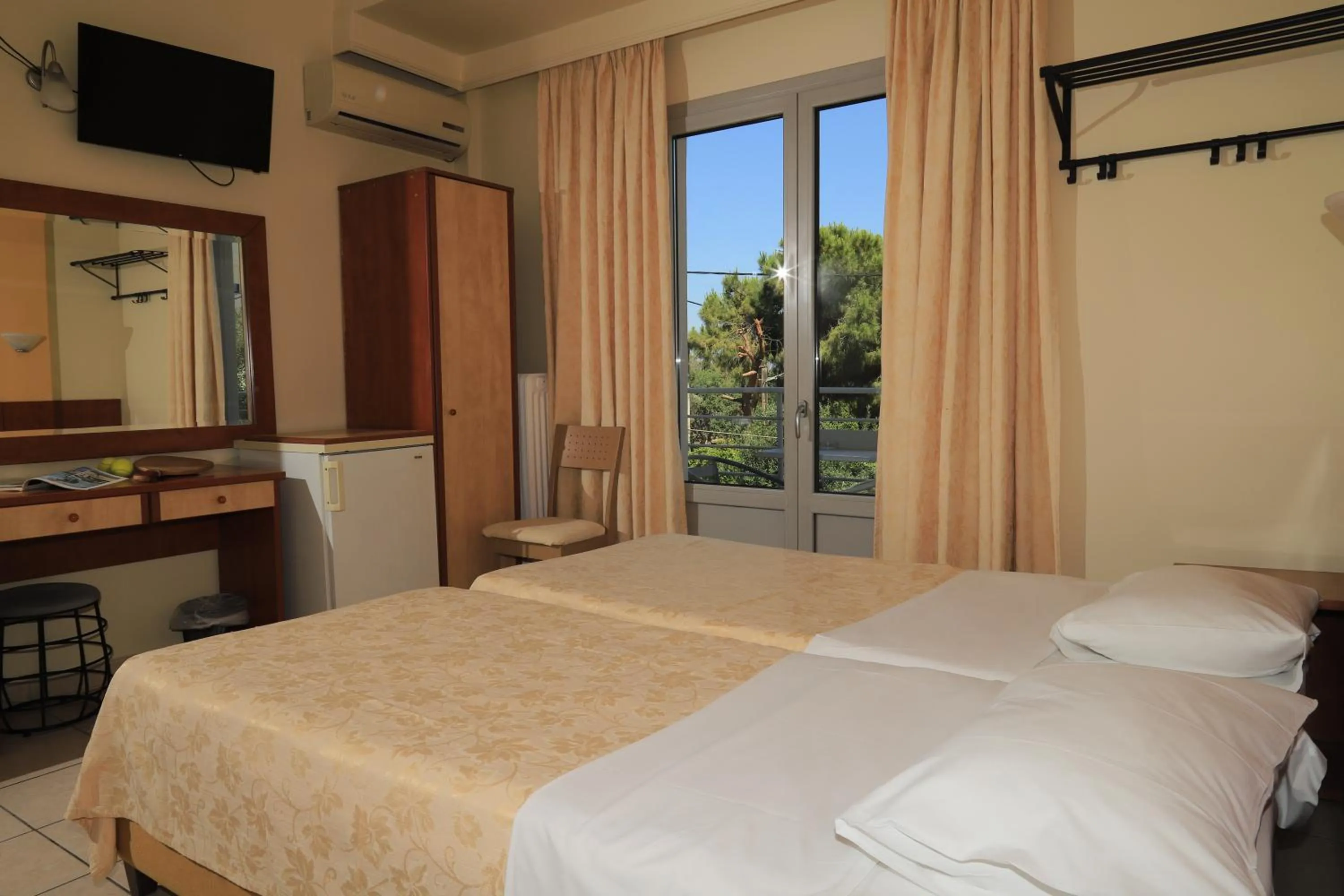 Bed in IKAROS Hotel ELLINIKO