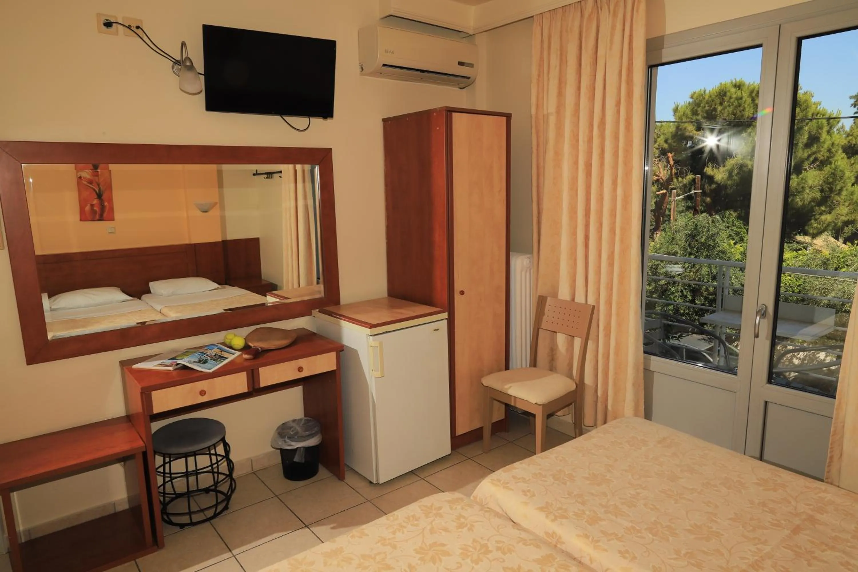 Bed in IKAROS Hotel ELLINIKO