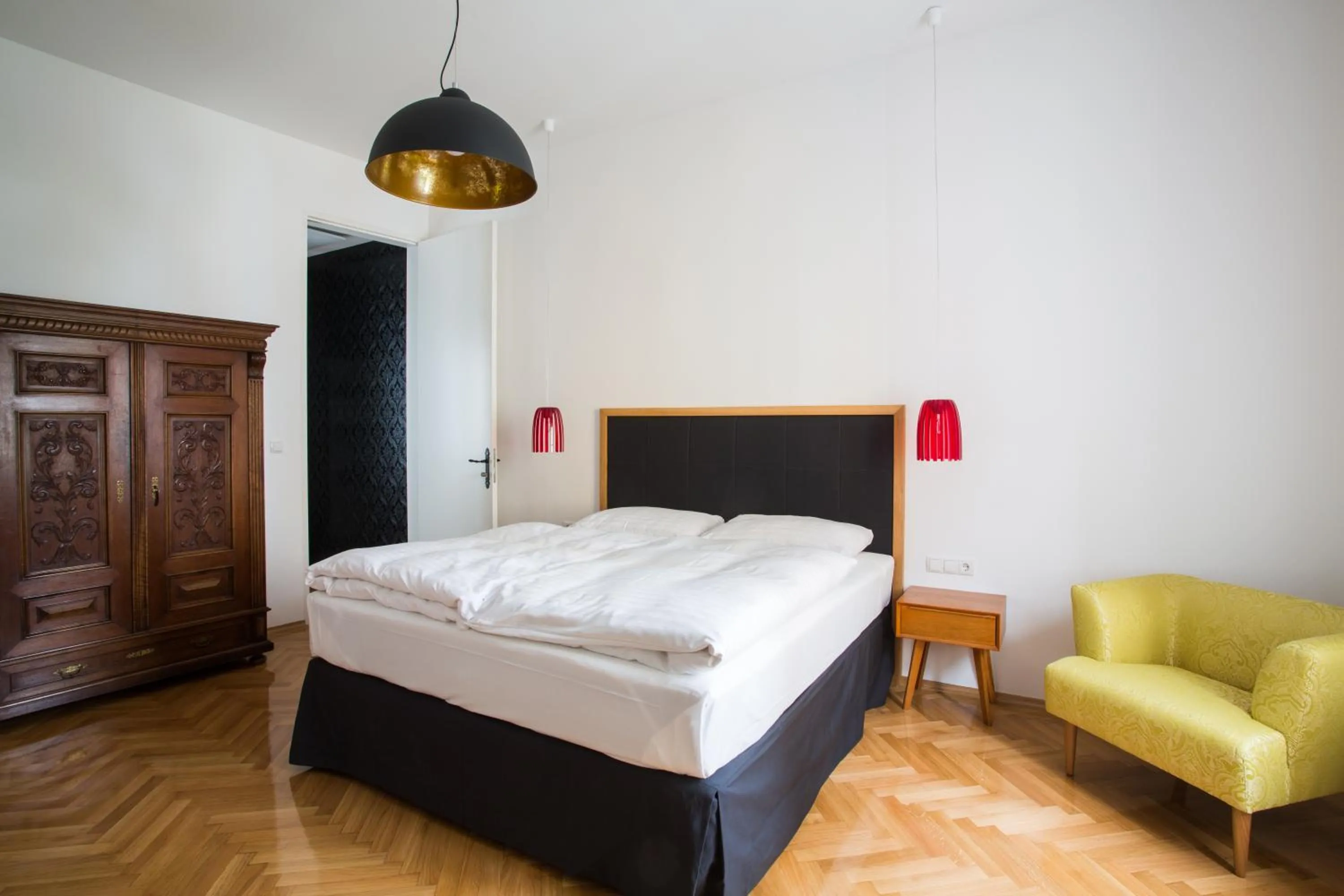 Bed in KIRCHENWIRT an der Weinstrasse - Boutique Hotel