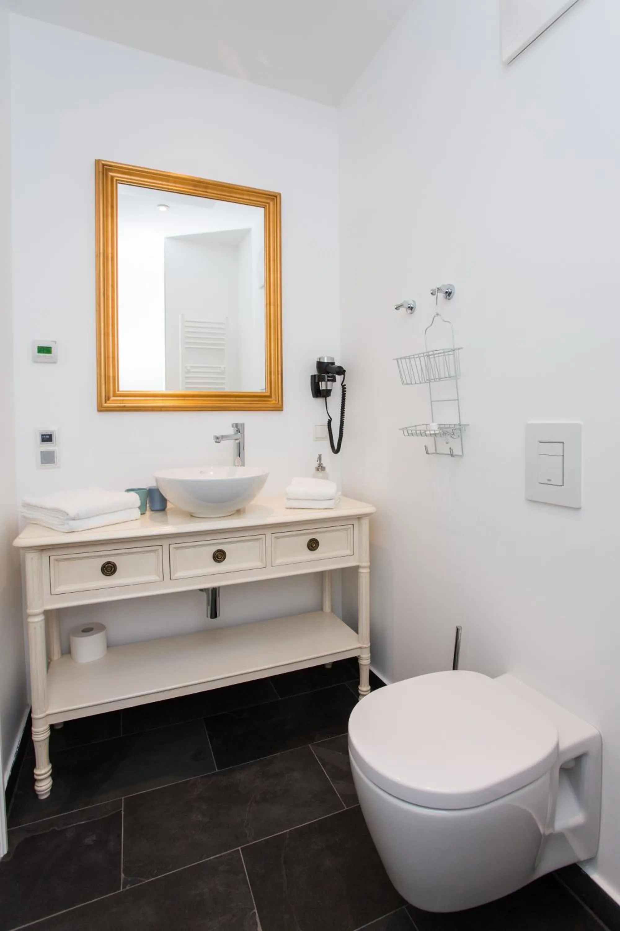 Bathroom in KIRCHENWIRT an der Weinstrasse - Boutique Hotel