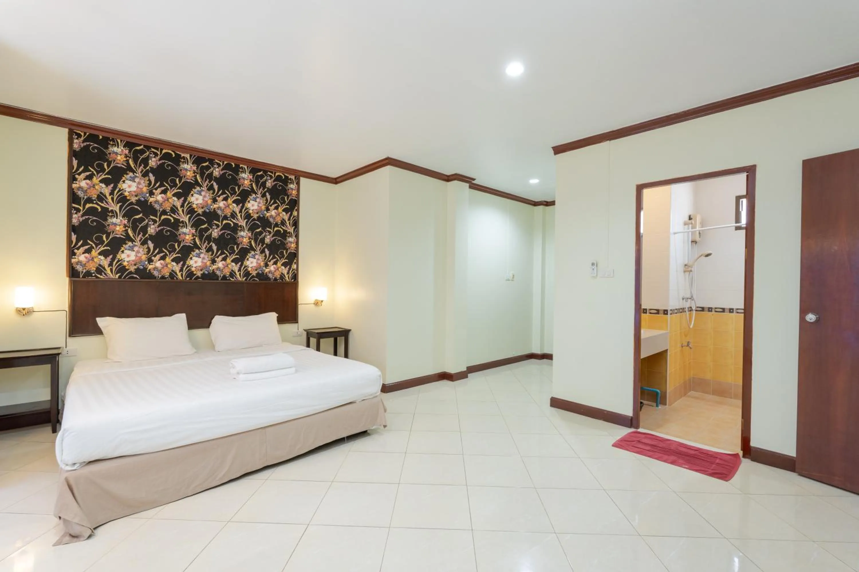 Bed in Amarin Hotel Patong