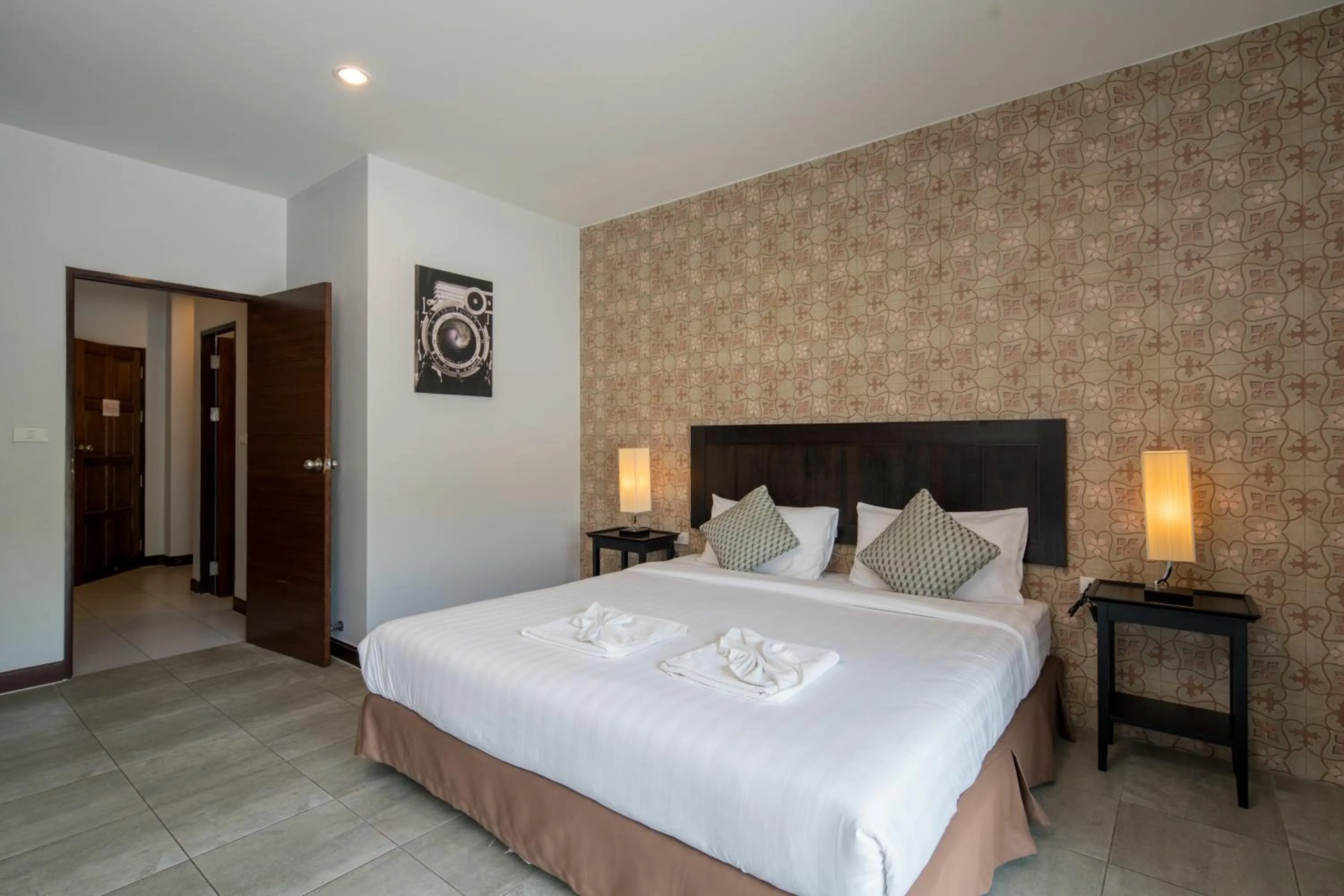 Bed in Amarin Hotel Patong