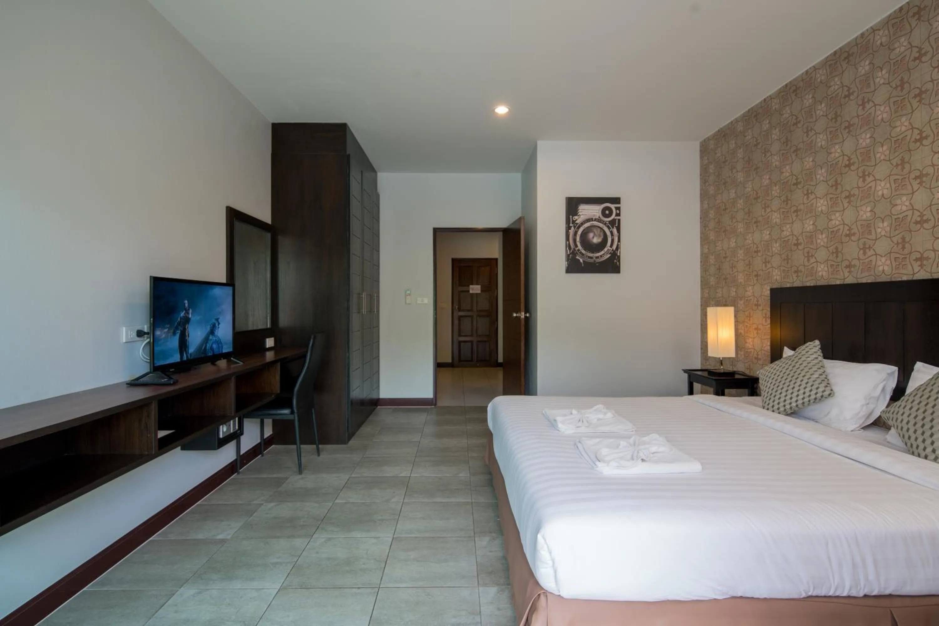 Bed in Amarin Hotel Patong