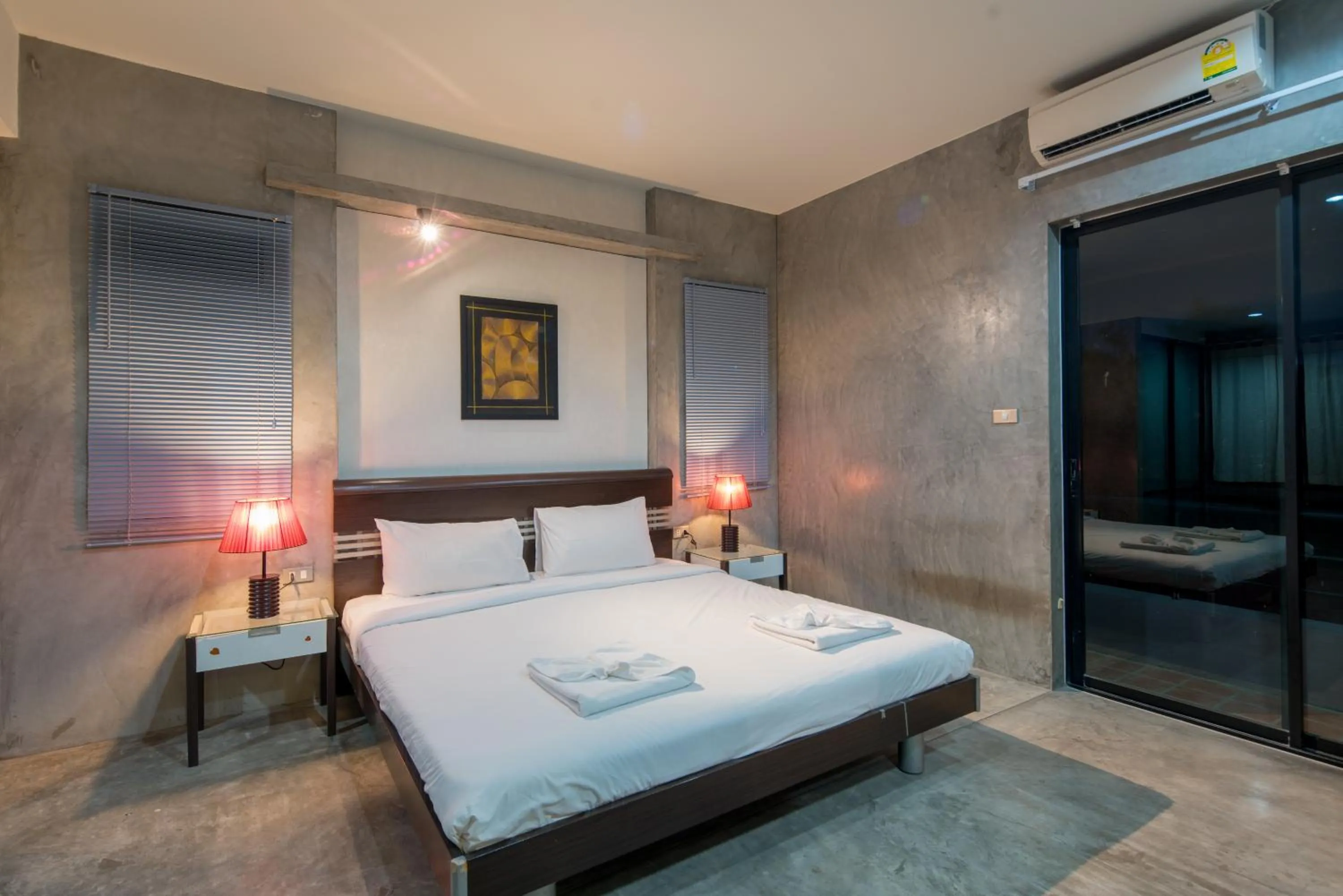 Bed in Amarin Hotel Patong