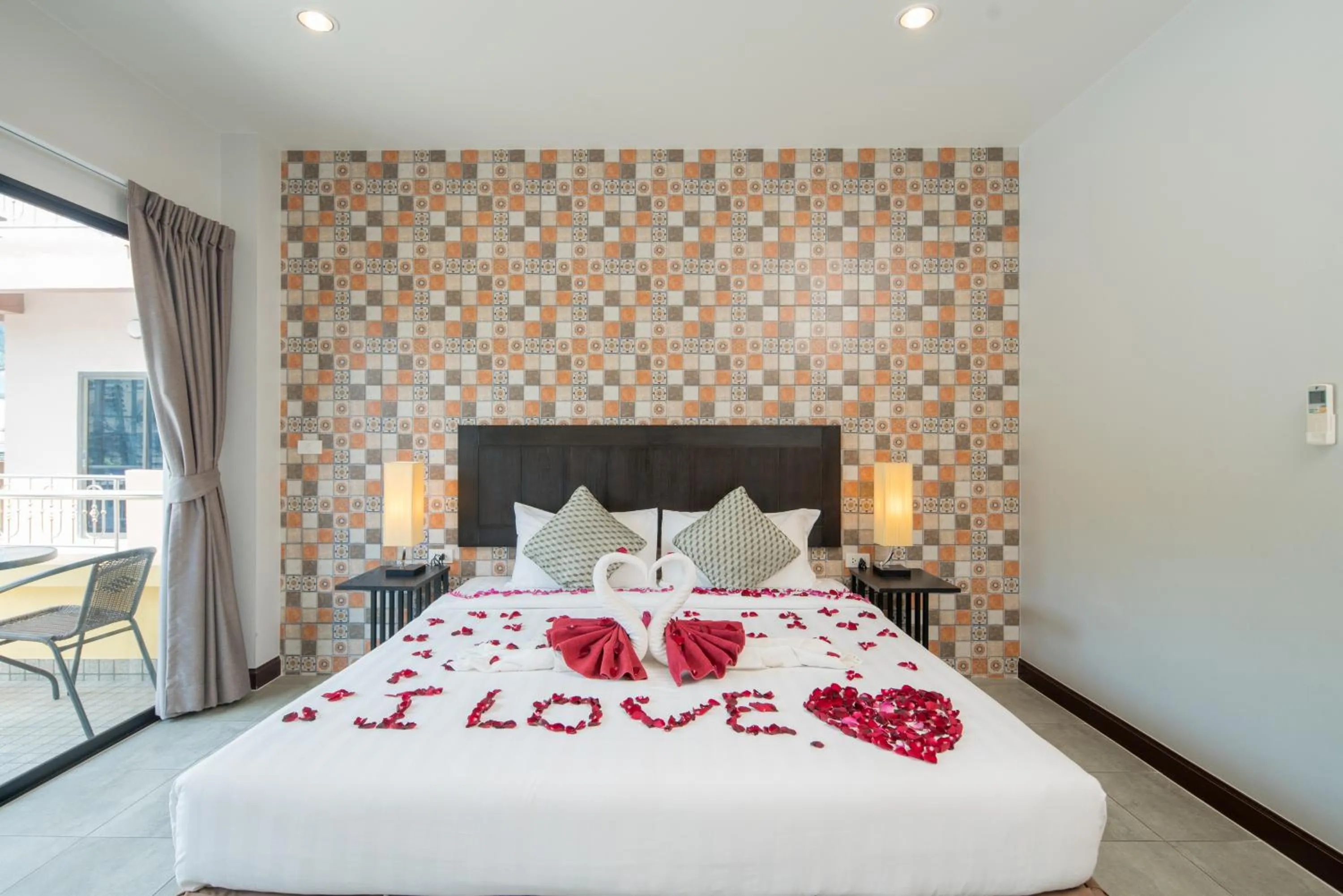 Bed in Amarin Hotel Patong