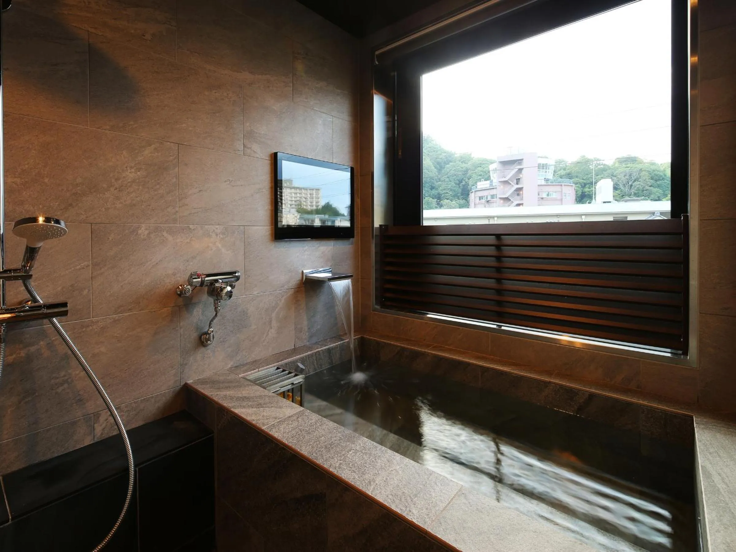 Bathroom in Arima Royal Hotel