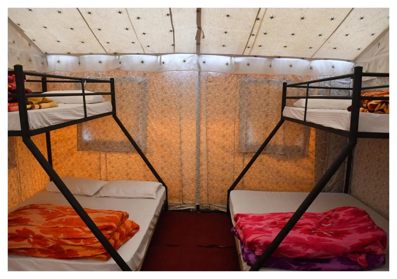 Bed in The Cocoon Camps & nature Resorts