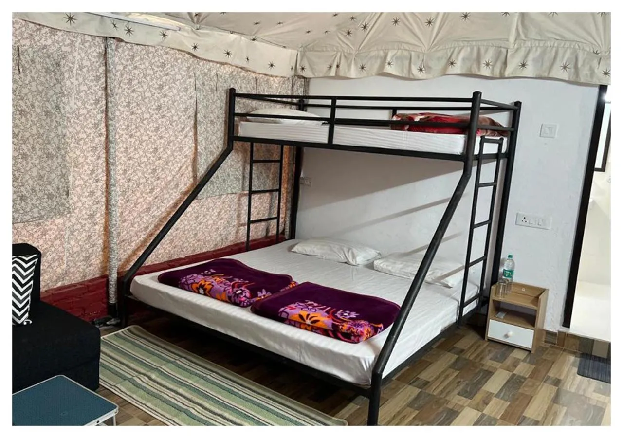 Bed in The Cocoon Camps & nature Resorts